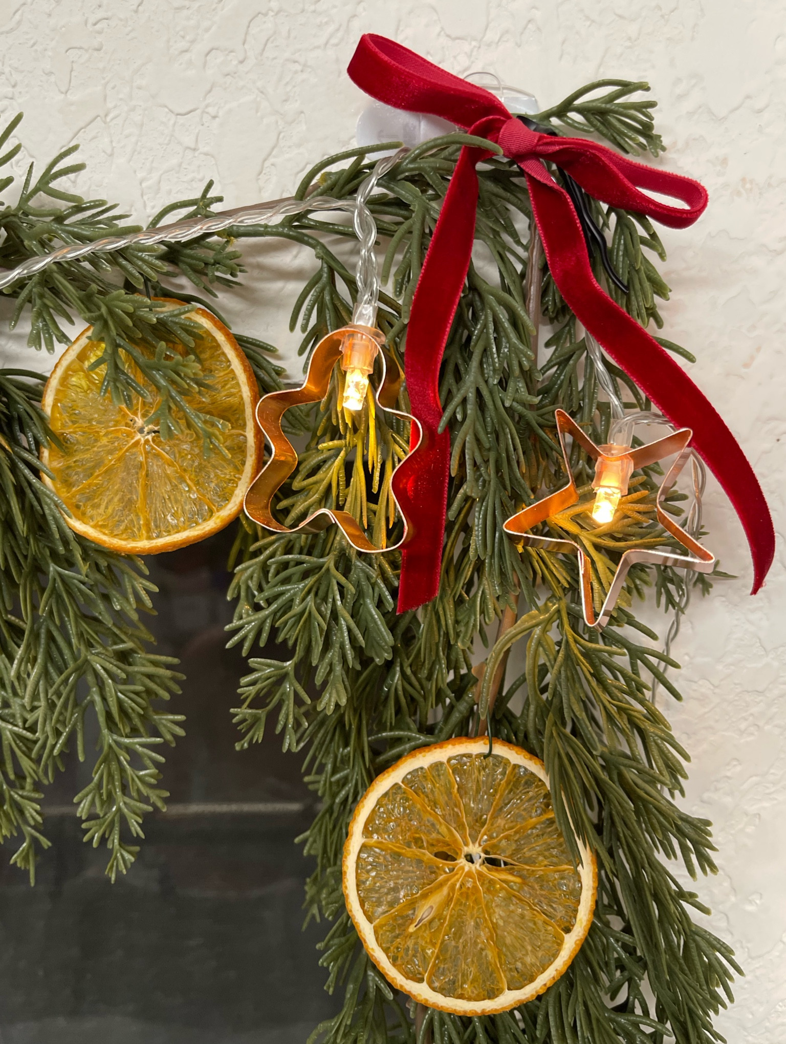 Christmas kitchen garland! I love the copper cookie cutter string lights from Michael’s!

#LTKSeasonal #LTKHome #LTKHoliday