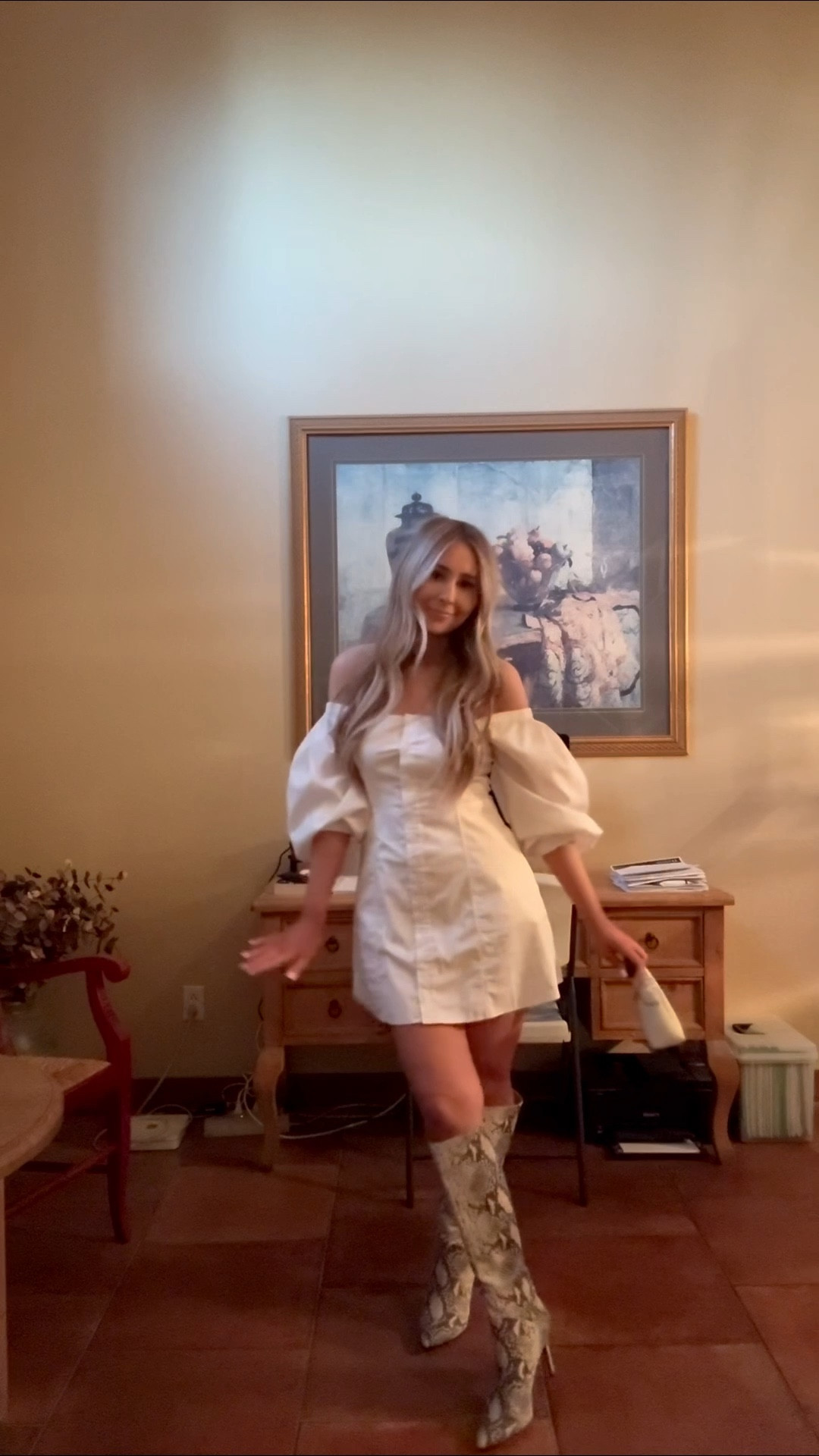 today’s ootn! 🐍

girls night out | date night outfit | snakeskin boots | white mini dress | white off the shoulder dress | white mini bag | knee high boots | amazon mini bag | ivory bag | 