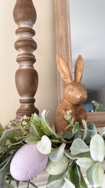 Easter mantel styling with Easter egg garland and wooden bunnies. 

Easter decor / easter mantel / easter home decor / spring decor / easter garland / easter bunnies / mantle mirror / candlestick holders 

#ltkfind #ltkunder50 #ltkunder100

#LTKhome #LTKsalealert #LTKSeasonal