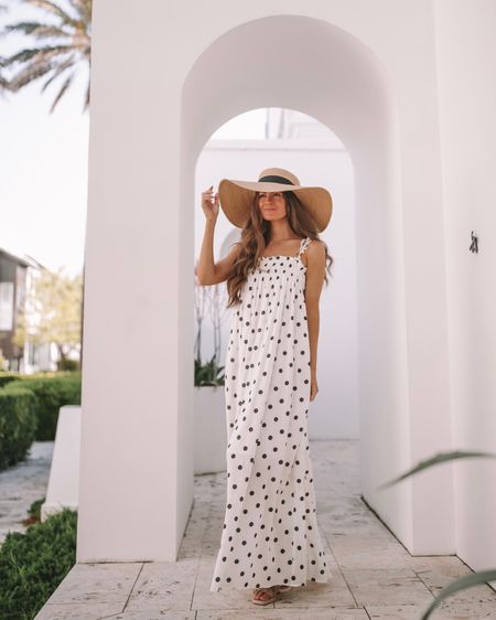 You can never go wrong with a polka dot dress and a sun hat! 
Sundress, black and white dress, straw hat, spring fashion, vacation fashion 

#LTKtravel #LTKSeasonal #LTKfindsunder100