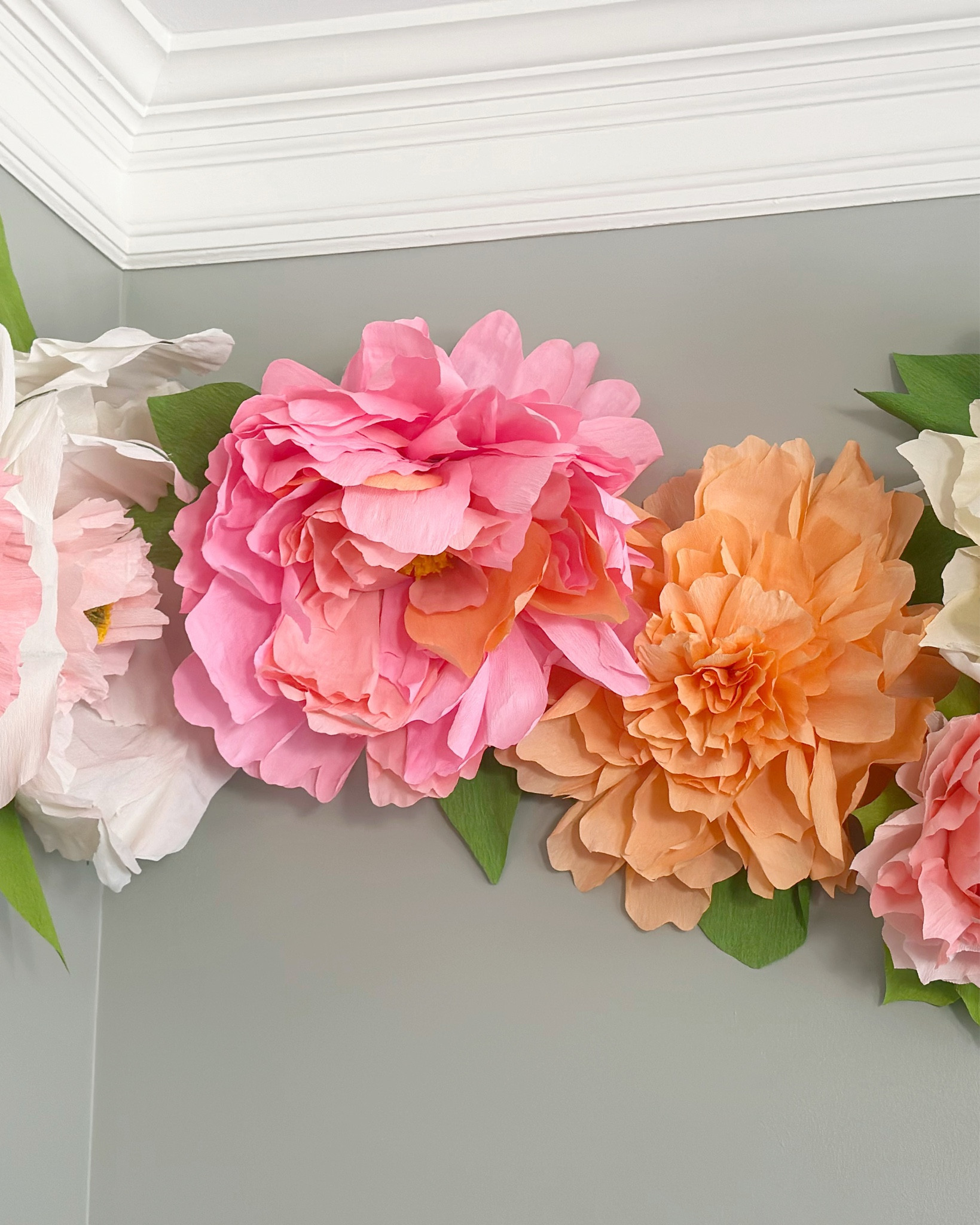 We hosted a floral arranging party this spring! In the corner of the room, Julie had created a whimsical backdrop of 3D crepe paper flowers in shades of pink, coral, white, and green. This playful feature was designed not just for decoration, but as the perfect photo spot. The Wine Wenches couldn’t resist pausing to snap a few photos before diving into their floral arrangements.

https://southernhospitalityco.com/2025/03/07/blooming-creativity-a-floral-arranging-party/

#LTKSeasonal #LTKHome #LTKParties
