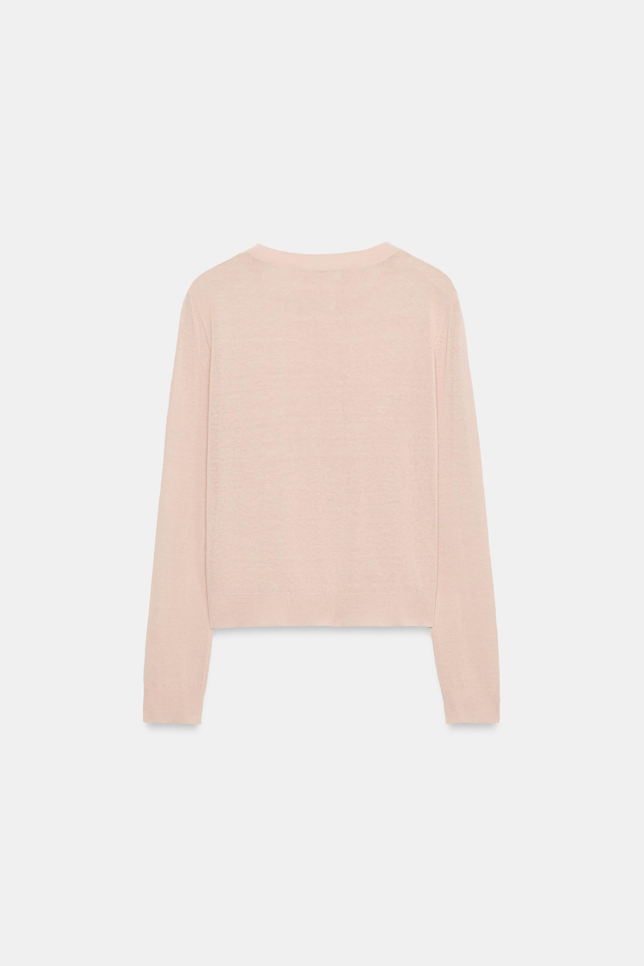 Long-sleeve jumper with a crew neck and front buttons. | Zara US