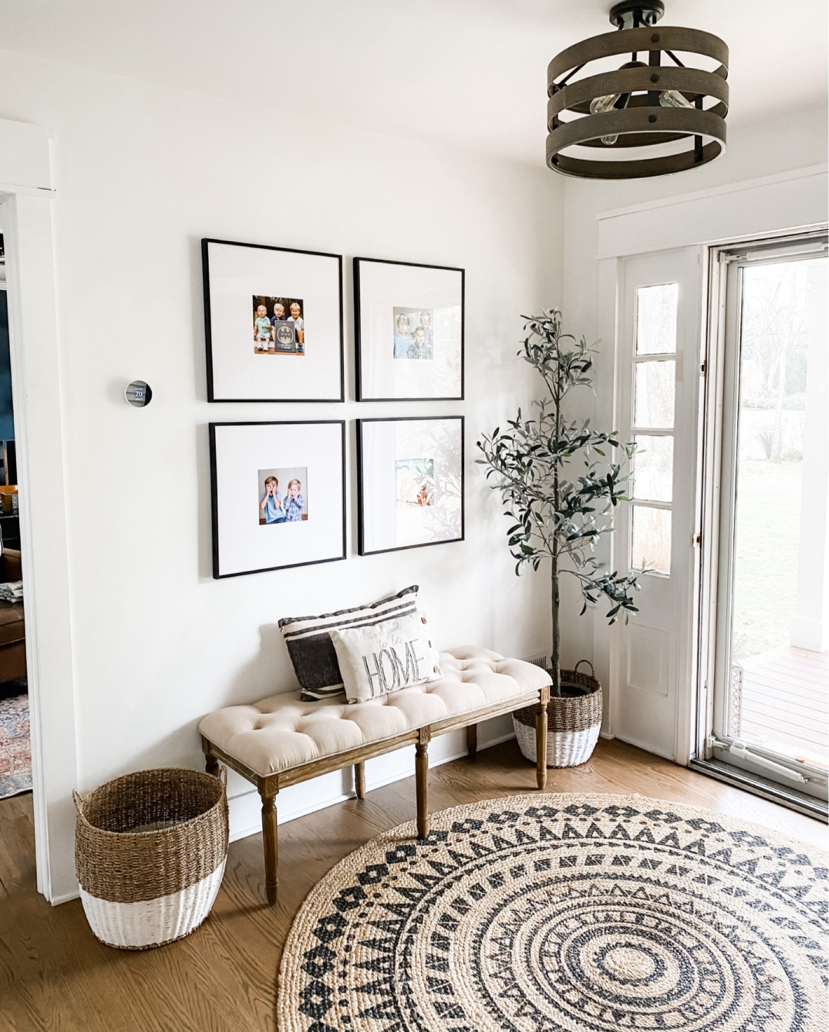 Foyer Gallery Wall with bench seating, olive tree and round entry rug , all from Target! 

#LTKunder50 #LTKstyletip #LTKhome

#LTKSummerSales #LTKFindsUnder100 #LTKHome