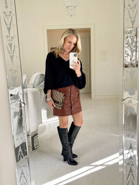 A leather skirt is a must have for fall! I’ve paired it  with a vneck balloon sleeve sweater and tall black boots.  

#LTKshoecrush #LTKSeasonal #LTKstyletip