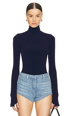 Norma Kamali Slim Fit Long Sleeve Turtleneck Top in True Navy from Revolve.com | Revolve Clothing (Global)