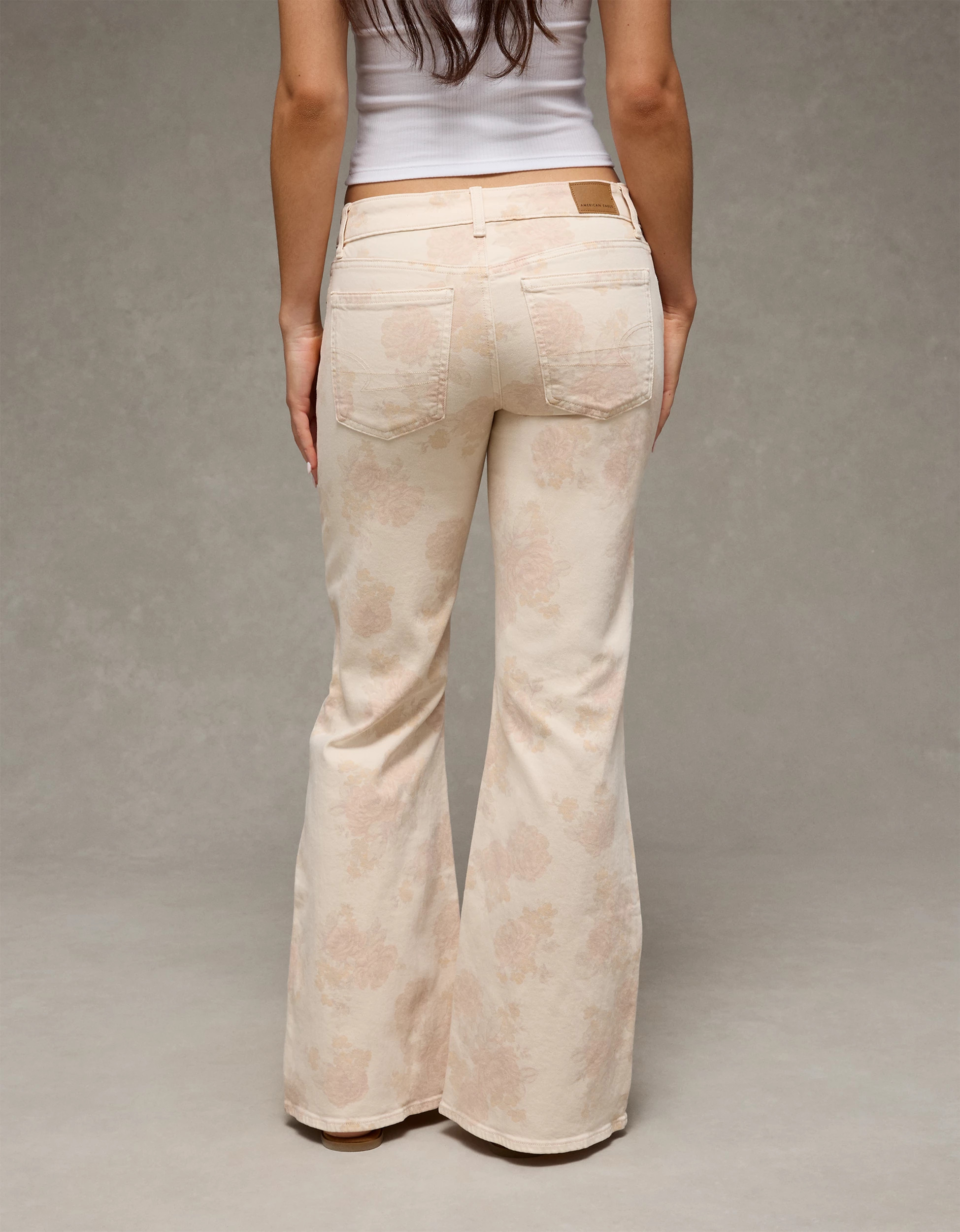AE Stretch Low-Rise Floral Print Flare Jean | American Eagle Outfitters (US & CA)