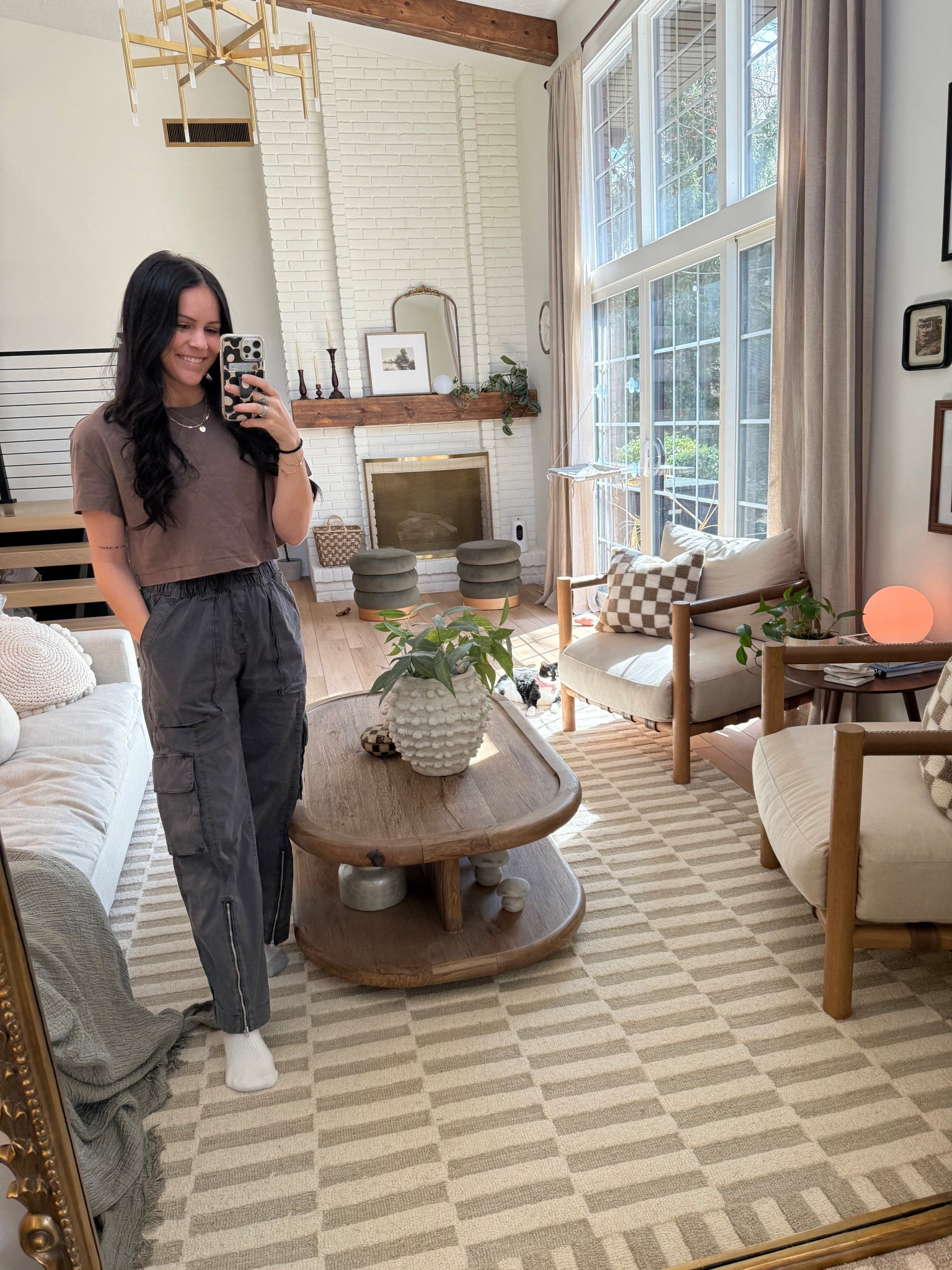 My favorite cargo pants and the comfiest crop top 🫶🏼 wearing a medium in the top and XS in the pants, they’re really oversized. #ootd #comfyootd #casualootd 

#LTKSeasonal #LTKHome #LTKSaleAlert