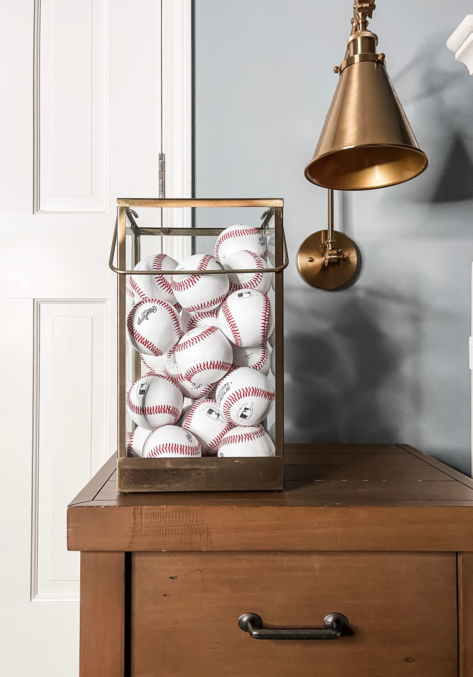 Fun baseball decor idea! 

#boysroom #baseball #lantern #wallsconce #amazon #target

#LTKunder100 #LTKstyletip #LTKunder50