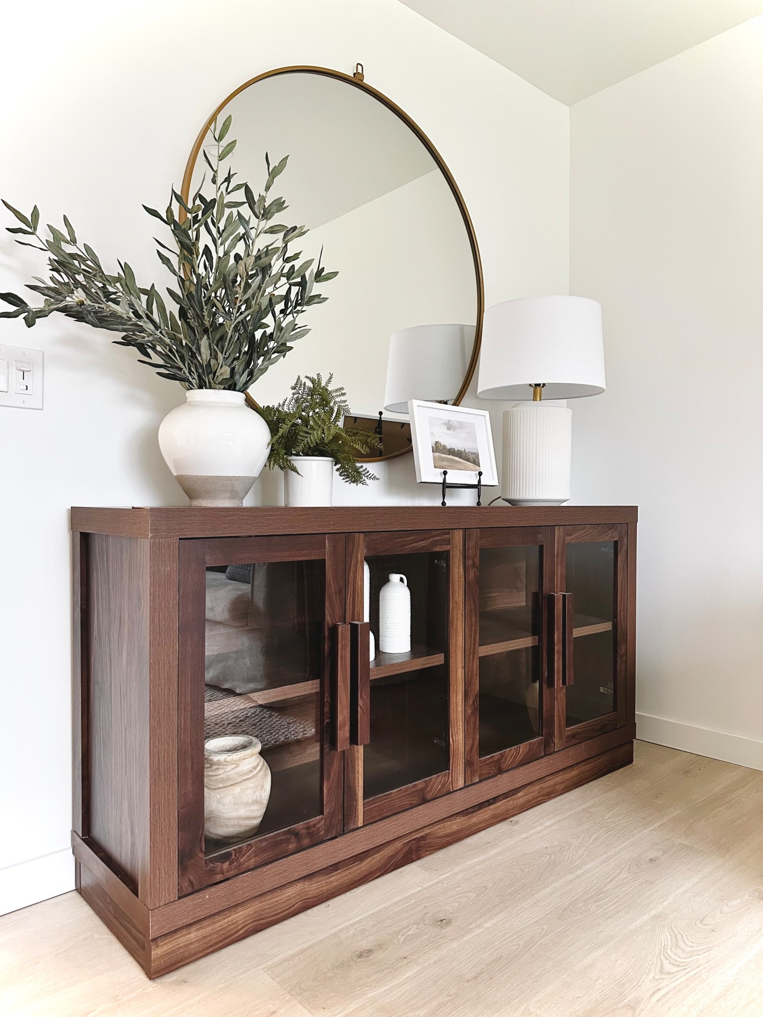 The best affordable glass cabinet from Better Homes and Gardens only at Walmart! Under $200! Available in 3 colors! Use as a console table, entry table or TV stand.

Home decor, decor ideas, home styling, interior design, interior designer, boujie on a budget, designer look for less, shelf styling

Follow my shop @mydivinehome on the @shop.LTK app to shop this post and get my exclusive app-only content!

#liketkit #LTKHome
@shop.ltk
https://liketk.it/54IvV

#LTKStyleTip #LTKSaleAlert #LTKHome