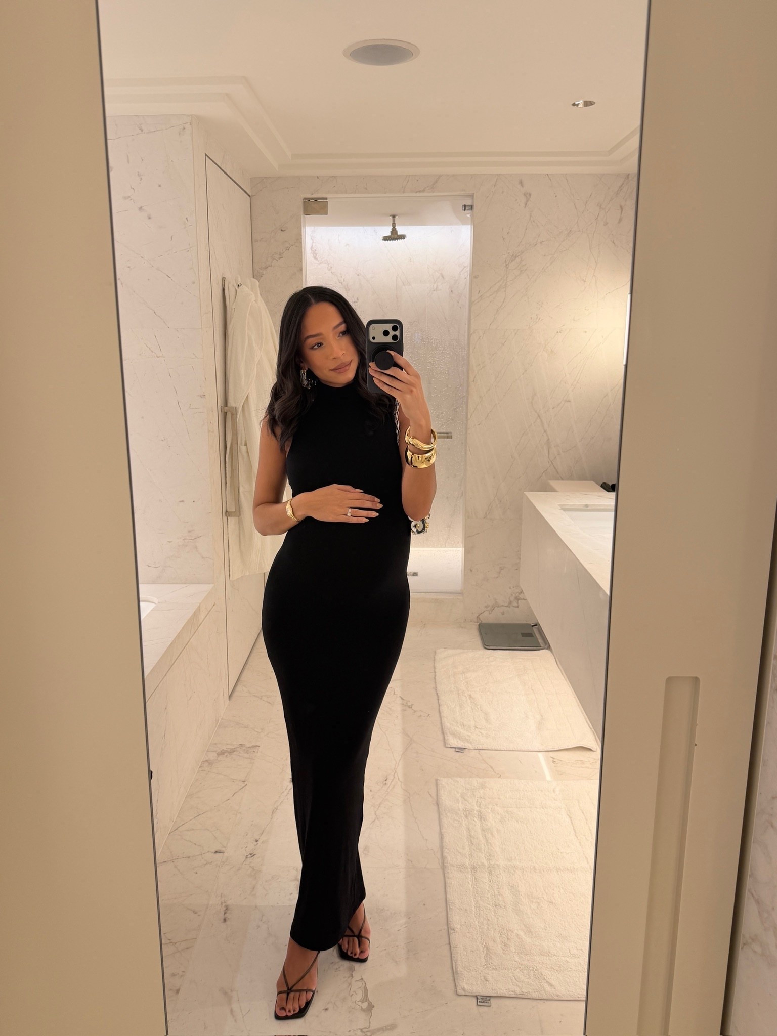 Date night outfit ✨ This dress is really stretchy, comfortable & bump-friendly! Would be so cute with a cardigan or jacket over top for chillier weather! Wearing size S black maxi dress 

Miami outfit 
Winter outfit 
Winter fashion 
Bump friendly dress 
Valentines outfit
Date night outfits
Vday outfit 

#LTKSeasonal #LTKValentine