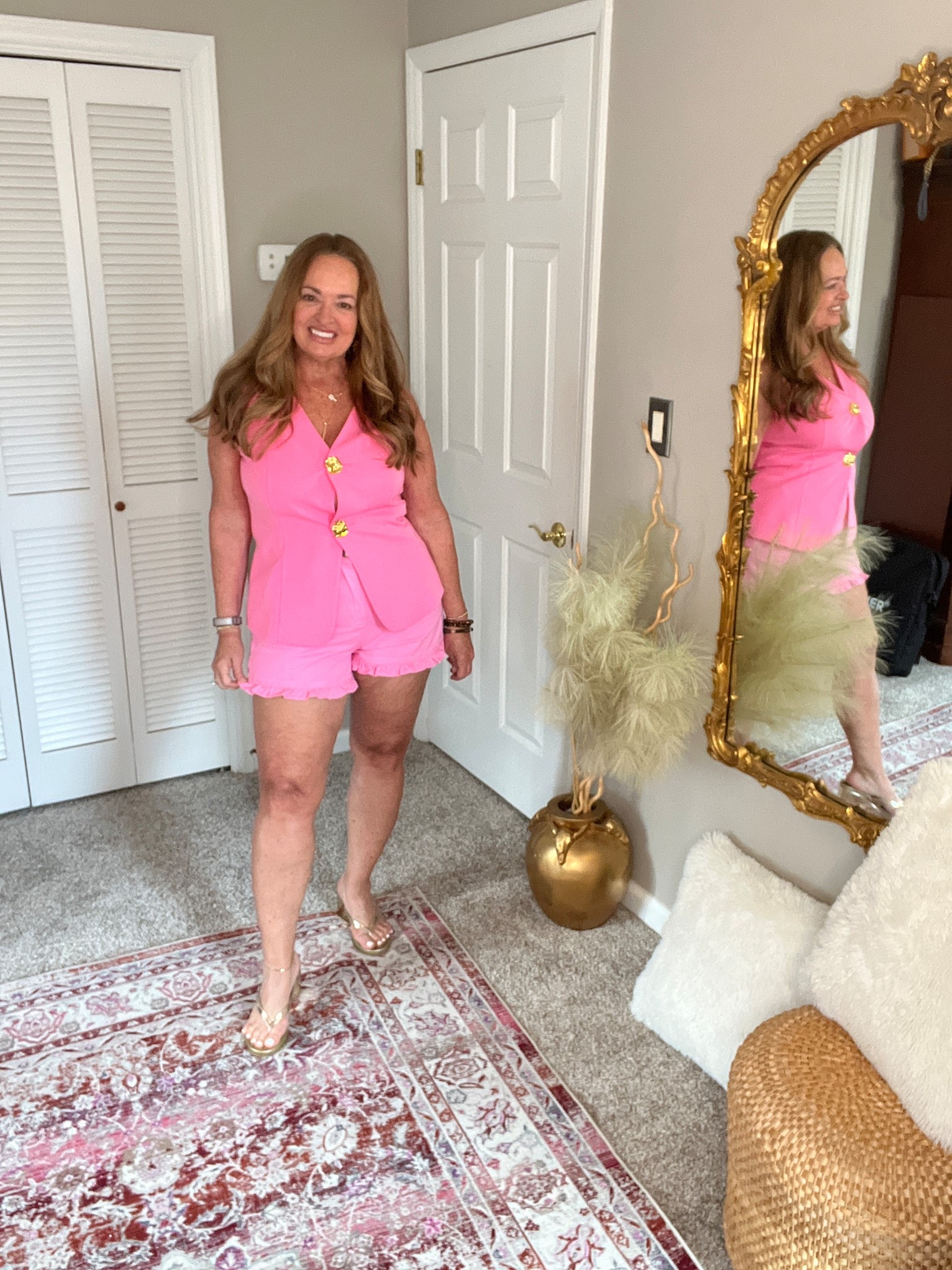 High waisted pink denim ruffled shorts.

#LTKmomlife #LTKFestival #LTKgrwm