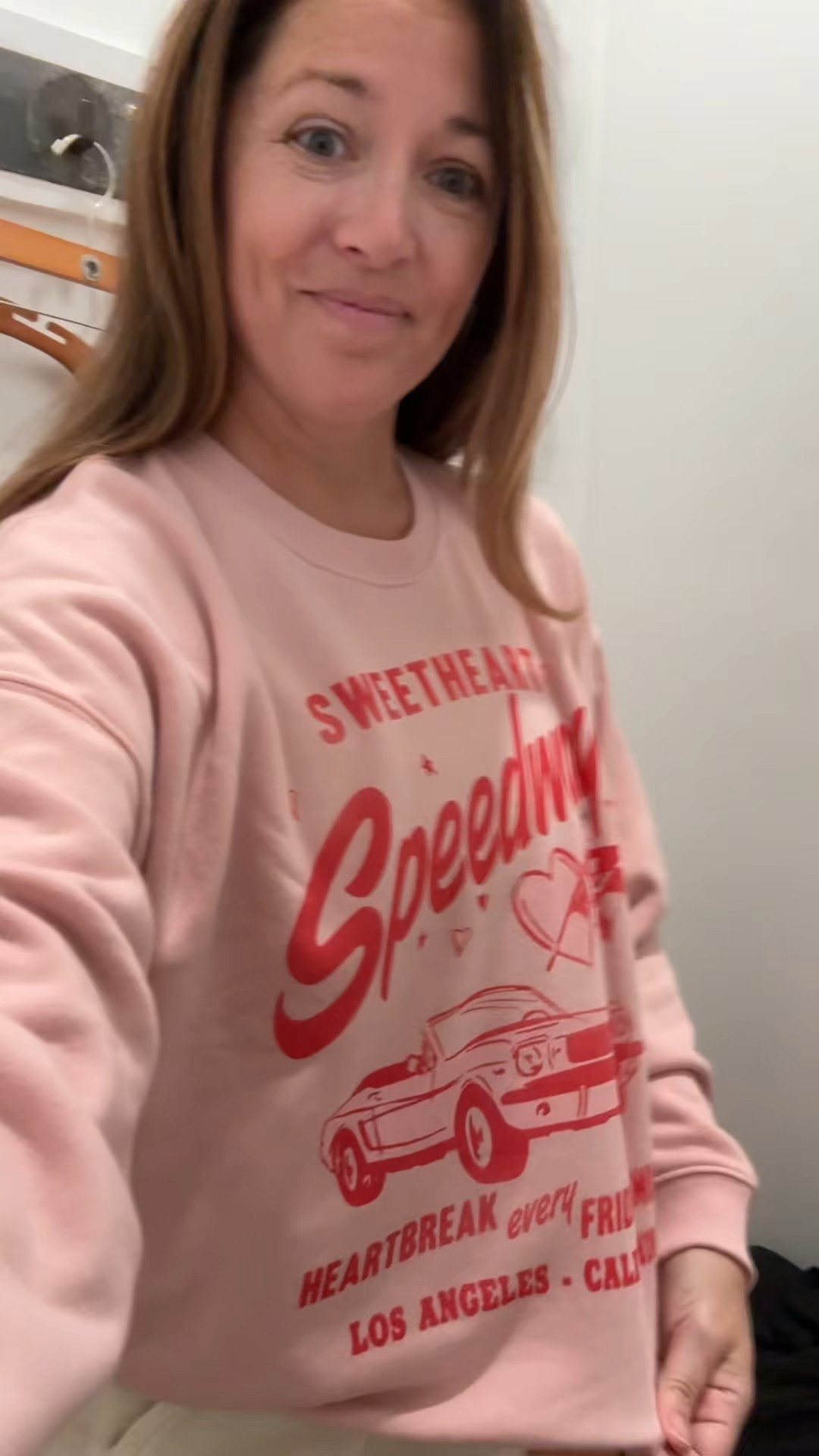 I don’t care how old I get… I will always wear an American Eagle sweatshirt 🤍
They’re just that soft, not too hot, and somehow still cute enough to leave the house in.

Found the coziest Valentine sweatshirt, a super soft + stretchy pajama cozy set, the cutest Valentine socks, and discovered that cozy jeans are a thing??
They look like wide-leg jeans but feel like sweatpants inside, have a stretchy waist, and come in both light and dark washes. I was influenced immediately.

If “comfortable but still put together” is your vibe, this whole try-on is worth a look. Everything’s linked and easy to shop and on sale online.

✨sizing: I got the sweatshirt in a Med and usually get a large!

—

cozy set, cozy pajamas, valentine pajamas, valentine sweatshirt, cozy jeans, wide leg jeans, soft loungewear, women’s cozy outfits, casual valentine outfit, comfortable everyday outfits #AmericanEagle

#LTKSaleAlert #LTKValentine #LTKMidsize