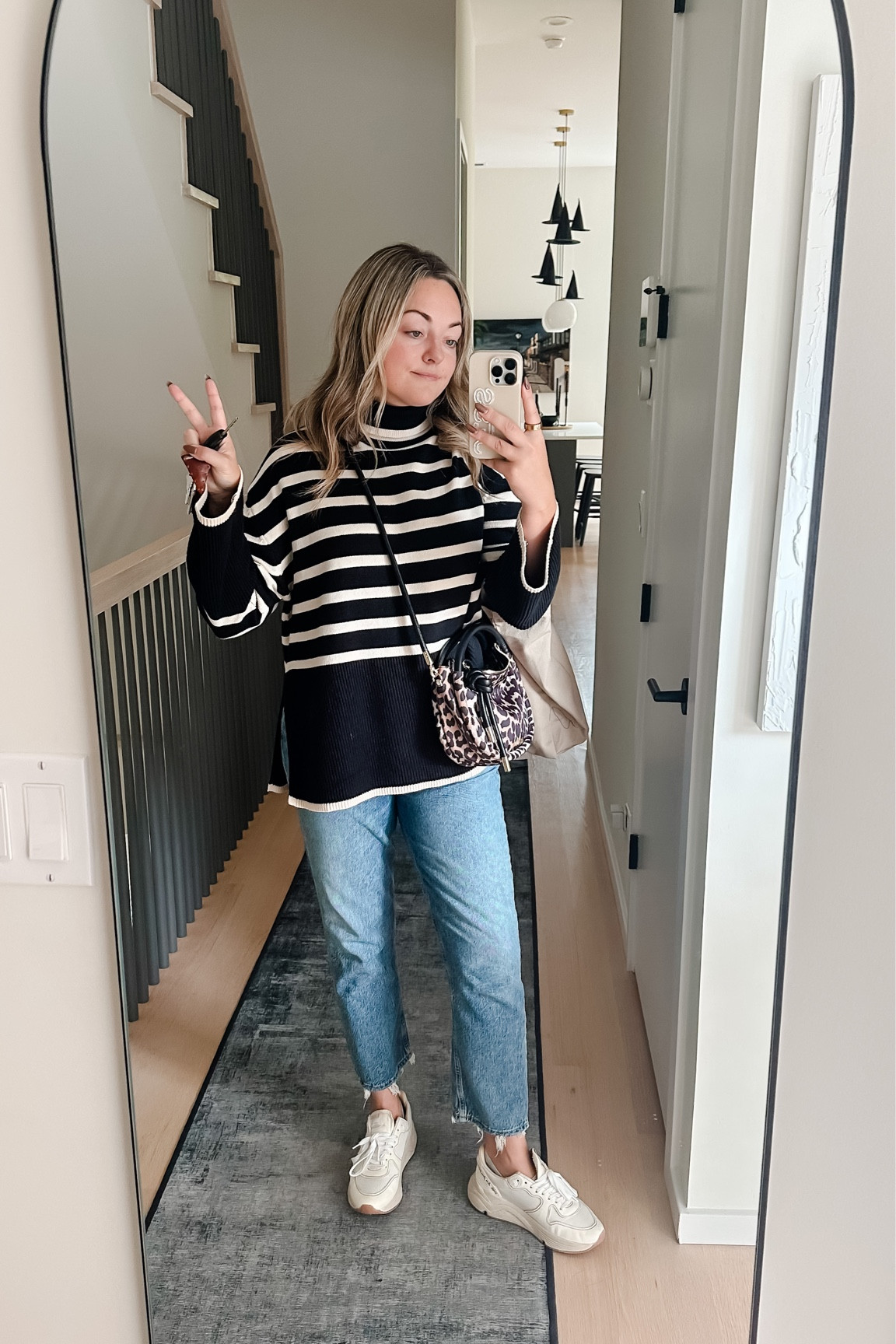 Amazon Striped Turtleneck Sweater - Medium - only $40. 
AGOLDE Jeans - TTS, size up for boyfriend fit.
Golden Goose Sneakers - this style runs big, go down a size.

#LTKfindsunder50 #LTKSeasonal #LTKxPrime