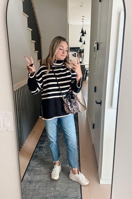 Amazon Striped Turtleneck Sweater - Medium - only $40. 
AGOLDE Jeans - TTS, size up for boyfriend fit.
Golden Goose Sneakers - this style runs big, go down a size.

#LTKfindsunder50 #LTKSeasonal #LTKxPrime