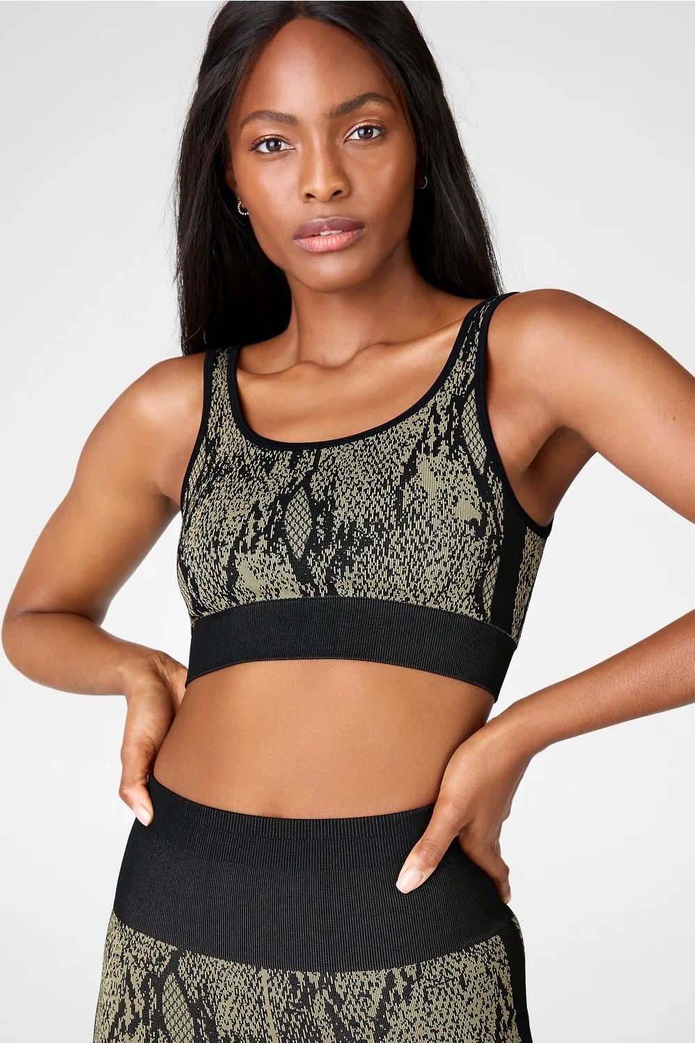 Our low-impact bra is a real snake charmer—and not just because of its allover snake print! Thi... | Fabletics