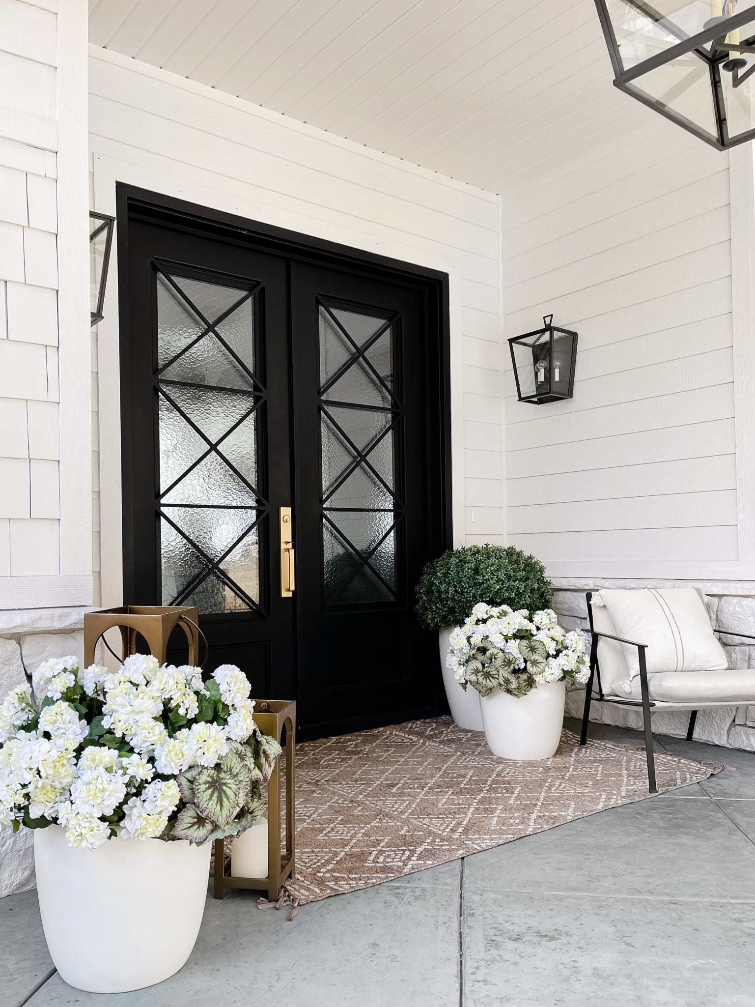 Loving our faux outdoor shrubs and white planters!

#LTKSeasonal #LTKstyletip #LTKhome