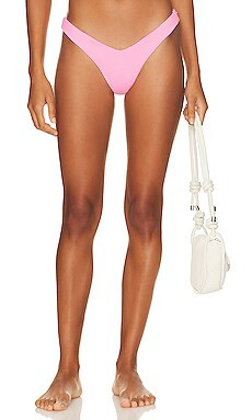 Kulani Kinis Y Cheeky Bikini Bottom in Bubblegum Pink Ribbed from Revolve.com | Revolve Clothing (Global)