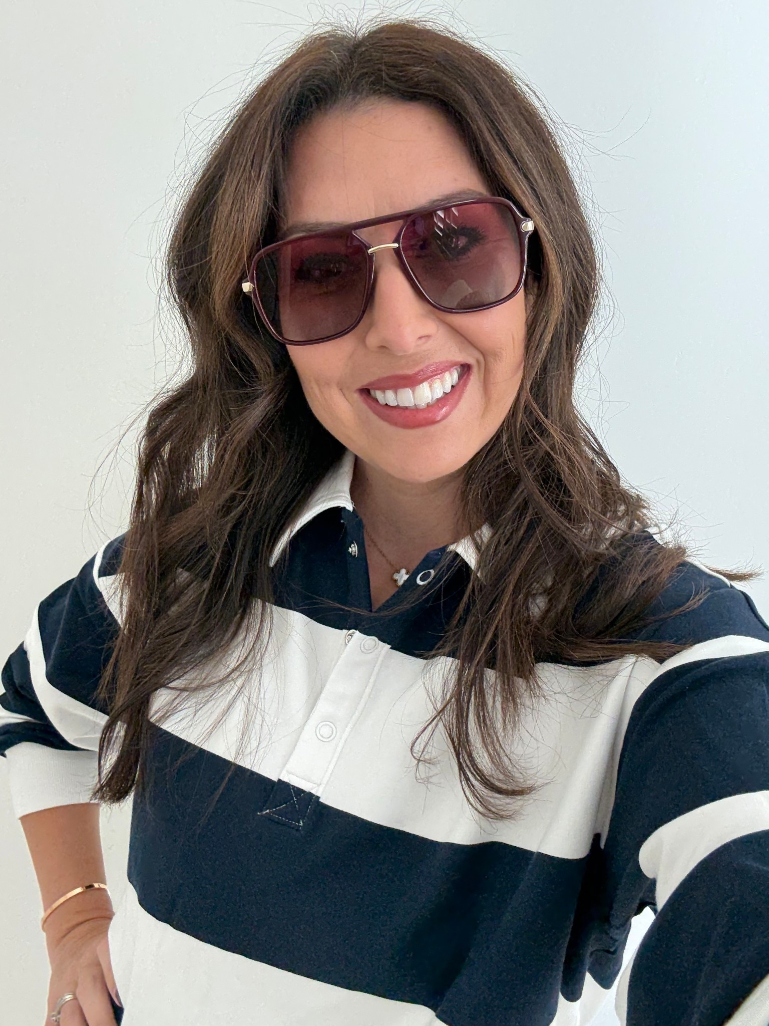 Rugby stripe shirt and burgundy sunglasses 

#LTKActive #LTKStyleTip #LTKPetite