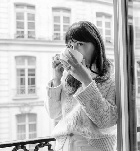 Cozy spring sweater sipping coffee in Paris. Wearing the Everlane sweater in size small in cream. 

#LTKover40