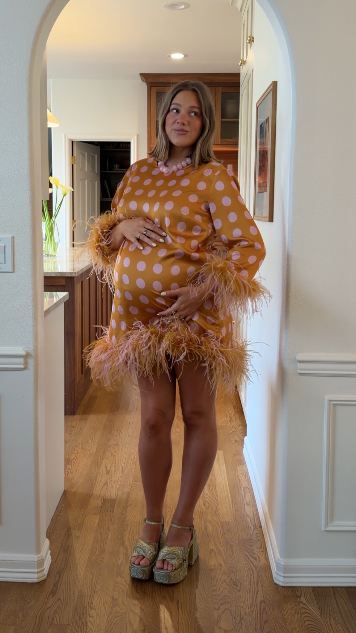 Size 10 in this polka dot feather dress (obsessed!!) I would take an 8 if I want pregnant. It has great length too I’m 5’ 5” and it’s mid to low thigh. Comfortable and so cute!! Platforms are amazing actually very easy to walk in and comfy. True to size! 

#featherdress #babyshowerdress #bresheppard #thirdtrimester #playformheels #polkadots #birthdaydress