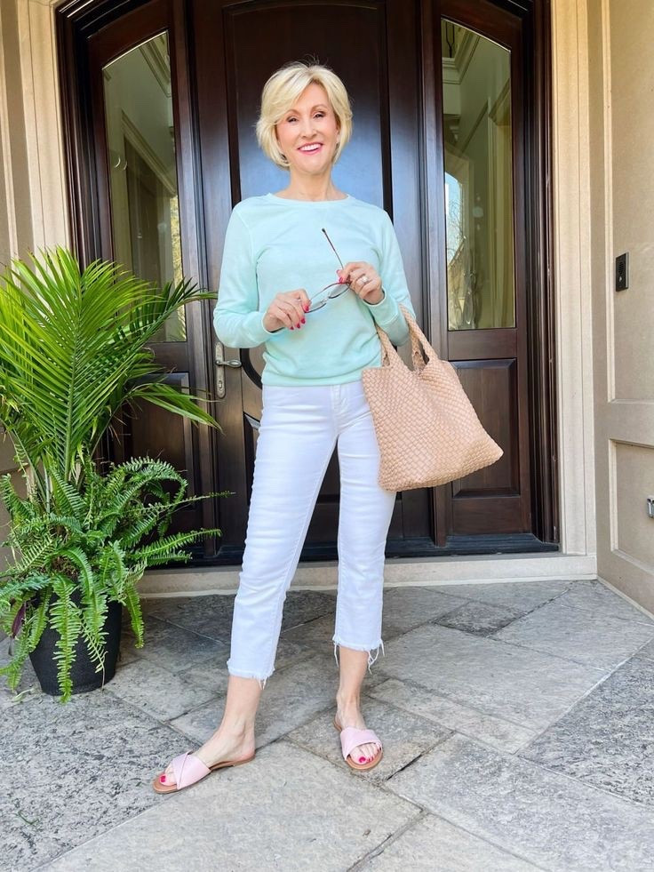Fresh, comfy, and casually chic 💧 This aqua sweatshirt paired with crisp cropped white pants is the perfect laid-back look with a pop of color. 

#Over50Style #CasualChic #FreshAndModern #AgelessStyle #LaidBackLuxury

#LTKStyleTip #LTKOver40 #LTKSeasonal