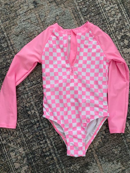 Cutest little girls rash guard swimsuit from Walmart.  Choose a bright color vs a cool color so it safer while in water! Under $12 😱

#LTKFind #LTKunder50 #LTKkids