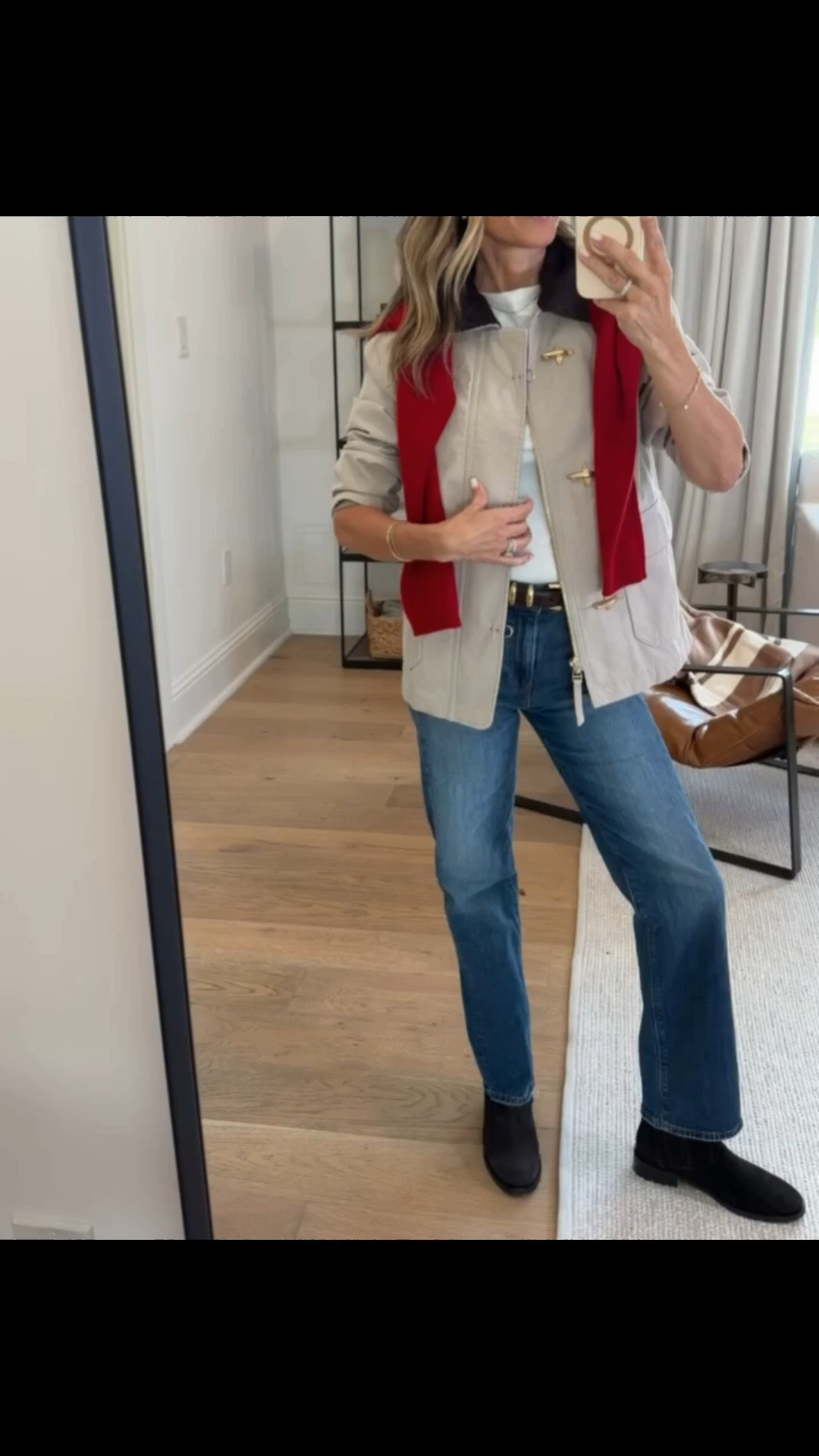 -red cashmere cardigan 
-brown belt with gold hardware 
-tan jacket with gold hardware and plaid on the inside
-straight leg jeans 
-lug sole boots

#LTKootd #LTKSeasonal #LTKOver40