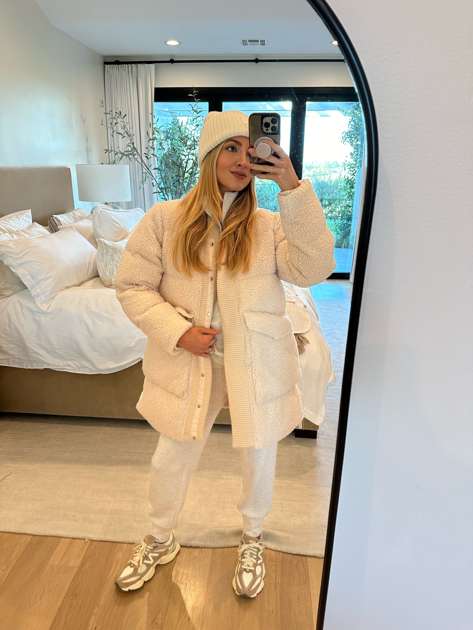 Cozy winter whites for an afternoon of errands ☁️ this Varley puffer jacket is so warm and cozy and I love the shearling/ bouclé inspired fabric. This is the grey sweat set is the one I always wear!

Sizes worn here:
Jacket XS (true to size relaxed fit?
Top XS (TTS)
Leggings XS (they come in two lengths - this is the longer but I wear both)
Shoes Men 7.5/women 9 (true to size unisex)

#LTKfitness #LTKGiftGuide #LTKSeasonal