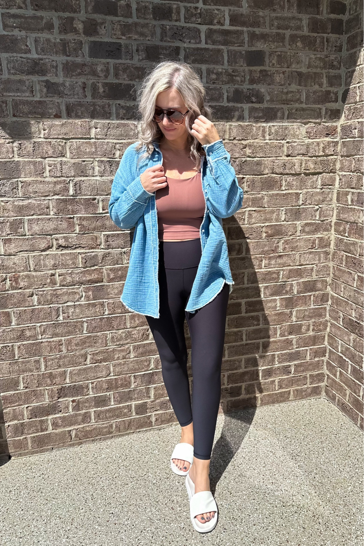 Love this oversized shirt for a layering piece. I buy my true size.

Casual outfit, oversized button down shirt, light wash shirt, black leggings, taupe tank top, aerie, pool to party cover up, old navy 

#LTKSaleAlert #LTKSummerSales #LTKOver40