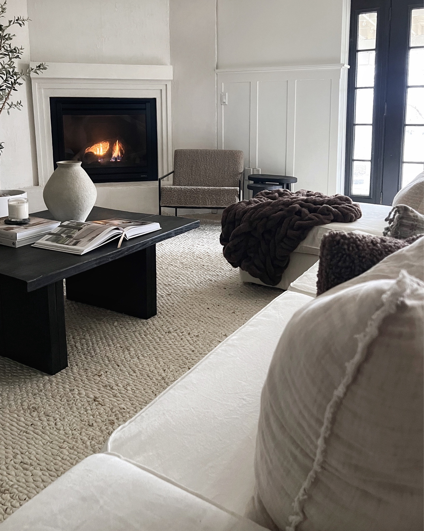 family room styling - my new Kent armchair by_crew use code: GRACEOAKSDESIGNS44 to save 20% customize frame + fabric I am obsessed with these chairs. Sleek + minimal but also comfortable & full of style 

Accent chair. Arm chair. Boucle chair. Jute rug. Neutral decor. Neutral rug. Throw blanket. Throw pillows. Cozy decor. Coffee table decor. Vase. Olive tree. Textured vase. 


#LTKsalealert #LTKhome #LTKstyletip