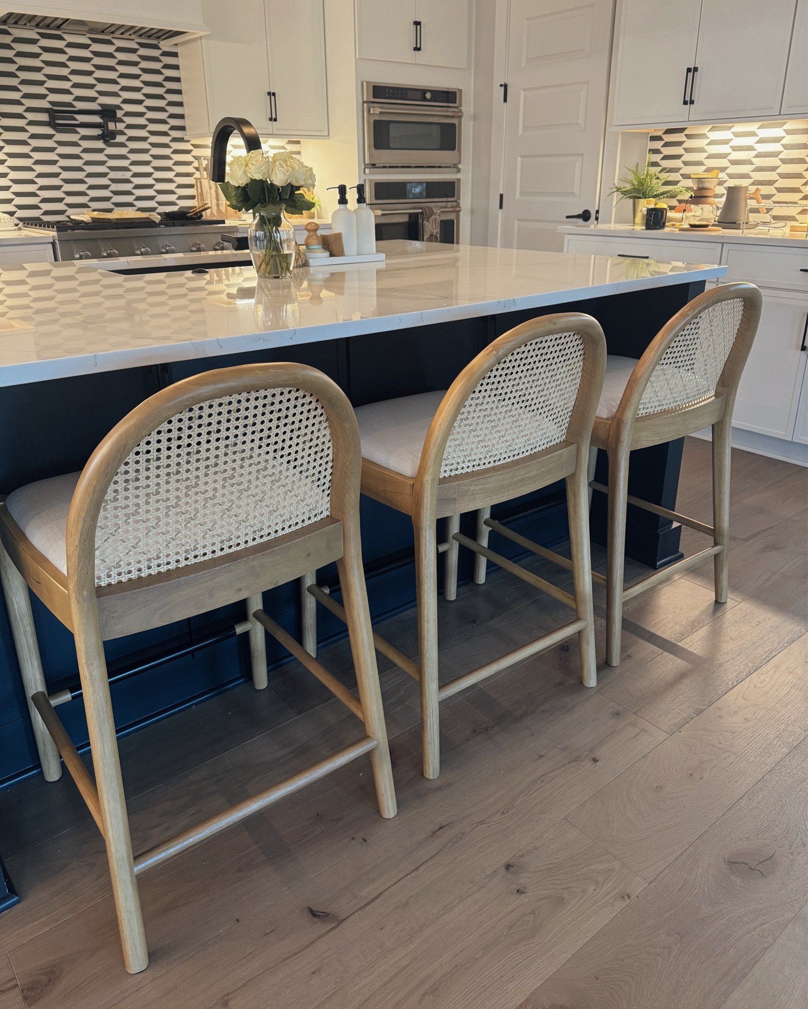 Modern Counter Stools, 26 inches standard counter height, rattan backrest, linen covered seats, wood legs, stools for kitchen island, beige. 

#LTKHome