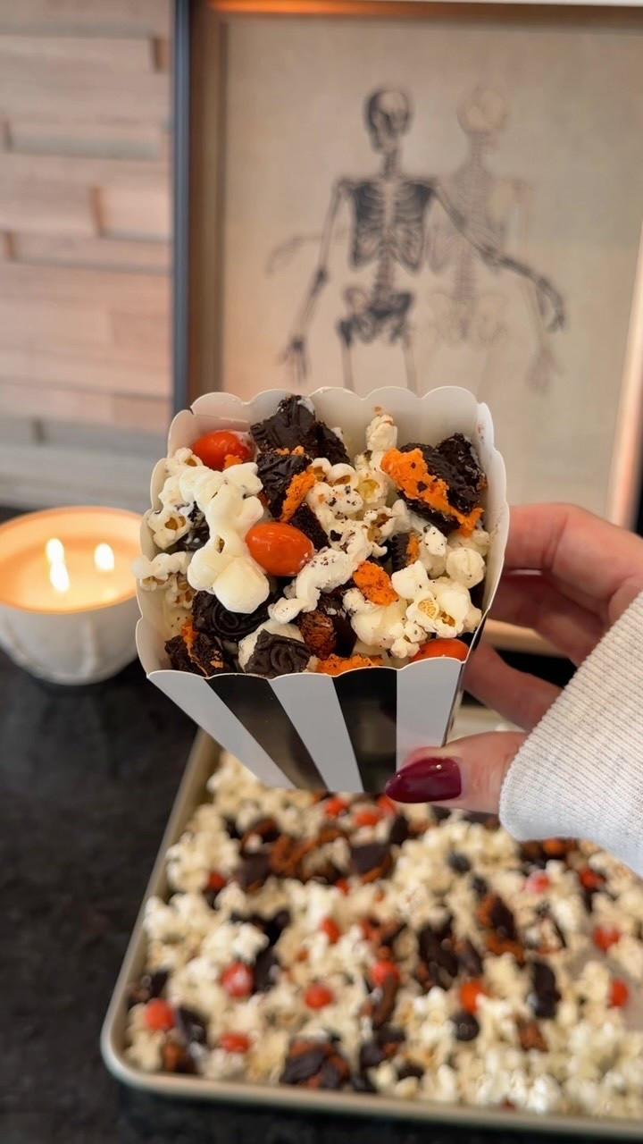 Spooky Snack Mix 👻🍿🖤

Ingredients
• LesserEvil Himalayan Pink Salt popcorn
• Ghirardelli white chocolate melting wafers
• Halloween Oreos, roughly chopped
• Halloween blend M&Ms (peanut butter or milk chocolate)

Directions
• Line a sheet pan with parchment and spread out the popcorn
• Melt white chocolate in 30 second intervals, stirring between
• Drizzle chocolate over popcorn 
• Top with Oreos and M&Ms while the chocolate is still wet
• Enjoy! 🧡
