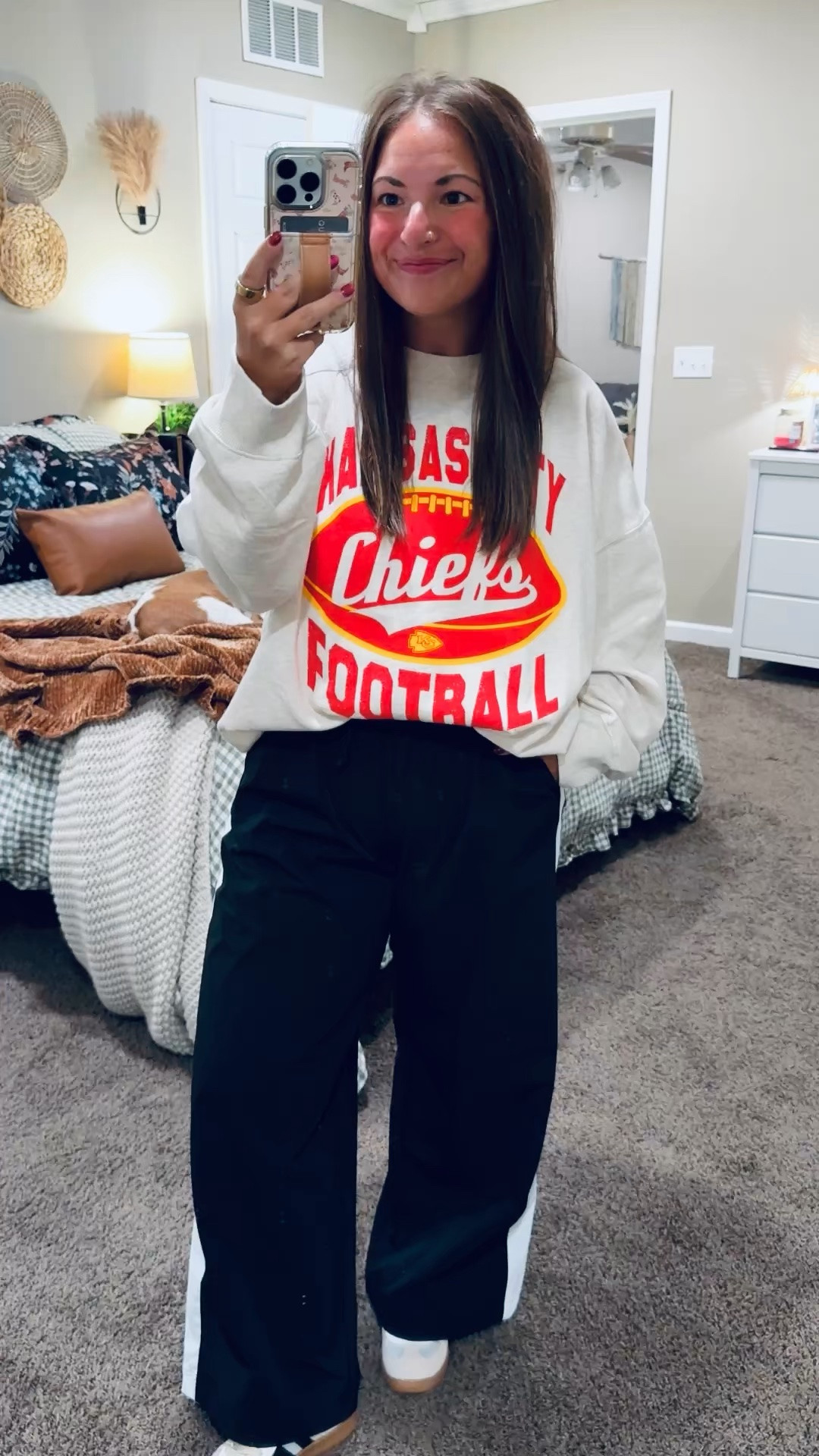 Chiefs game day outfit inspo! ❤️ Loving this graphic sweatshirt with black wide-leg pants & sneakers. A comfy, casual look for cheering on the Chiefs!

sneakers: fit true to size // wearing a 4
pants: fit oversized // wearing a medium
crewneck: fits oversized // wearing a large

#LTKootd #LTKMidsize