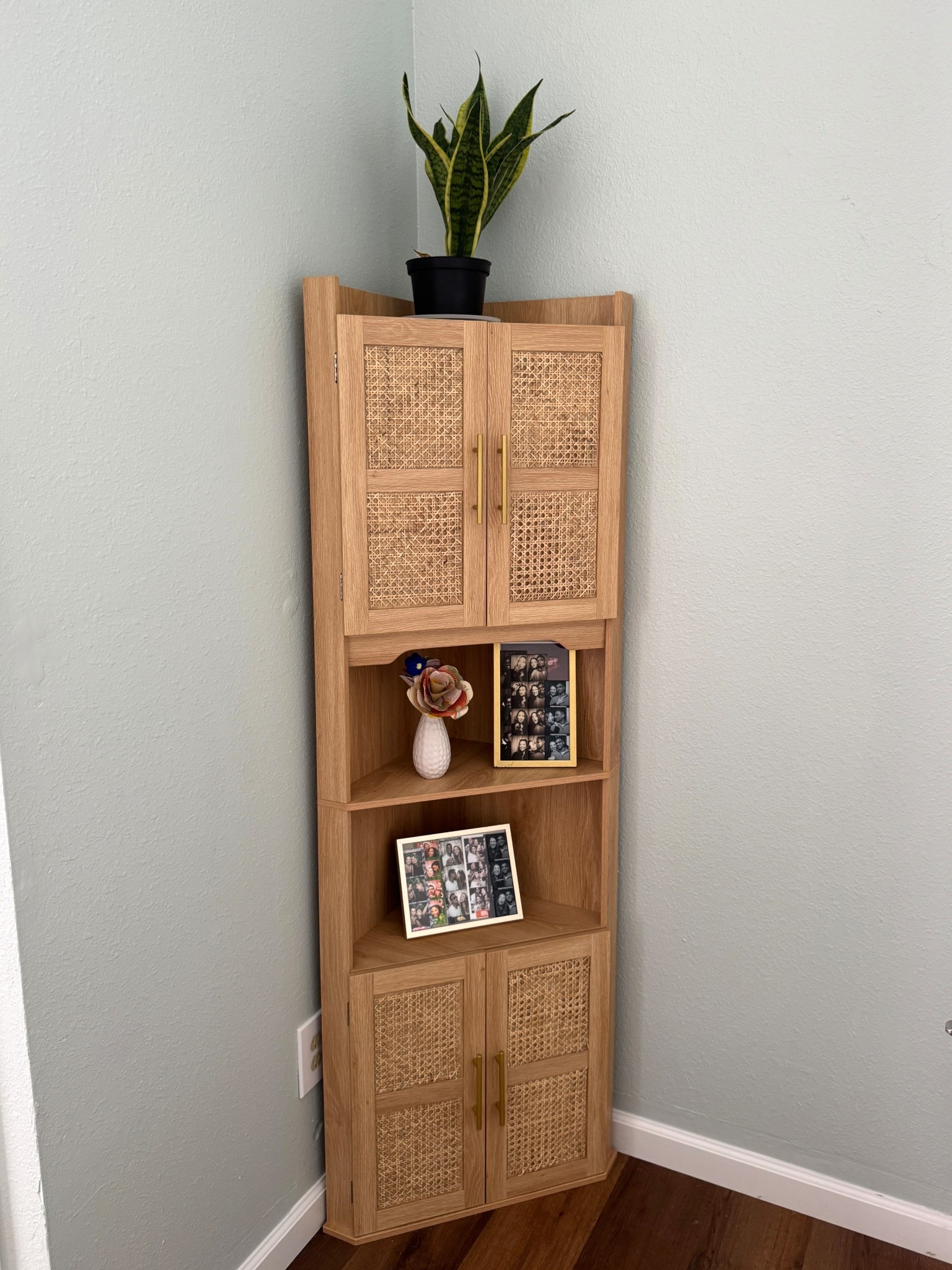 My favorite new edition, a corner shelf unit that fits perfect in small spaces but is so great for extra storage and displaying decor. Room decor. Apartment decor. Corner shelf. #homedecor 

#LTKHome #LTKFindsUnder100