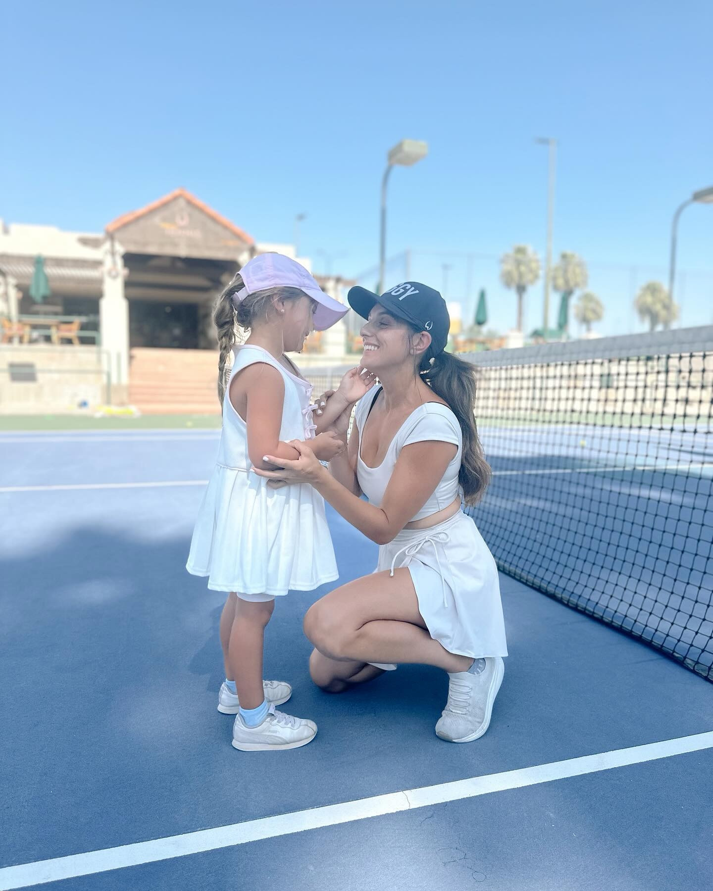 It is already the biggest honor of my life to be called this girl’s mama, but to be able to also add being her coach to that will be one of my greatest life’s treasures. 

I grew up with my dad being my coach my whole life & although we had an AMAZING experience, i want to add more to it. 

Everyday our 1-2 hours of tennis is the highlight of both our days. Its OUR time and we can do what we want with it on the court. We play, we laugh, we cry. We talk about everything and also talk about nothing. We work hard, and we rest. 

I want for the tennis court to mean so much more than just “this is where I play tennis”. I want build the tennis court to be her safe place. To be the place where she unwinds after a hard day or the place where she can escape life. 
 
I know we will have our tough moments on the court too, where we yell & cry full of frustration but that’s all part of the beauty! 

How excited I am to hold onto this for now, I cant wait to see what’s next 🤍🎾