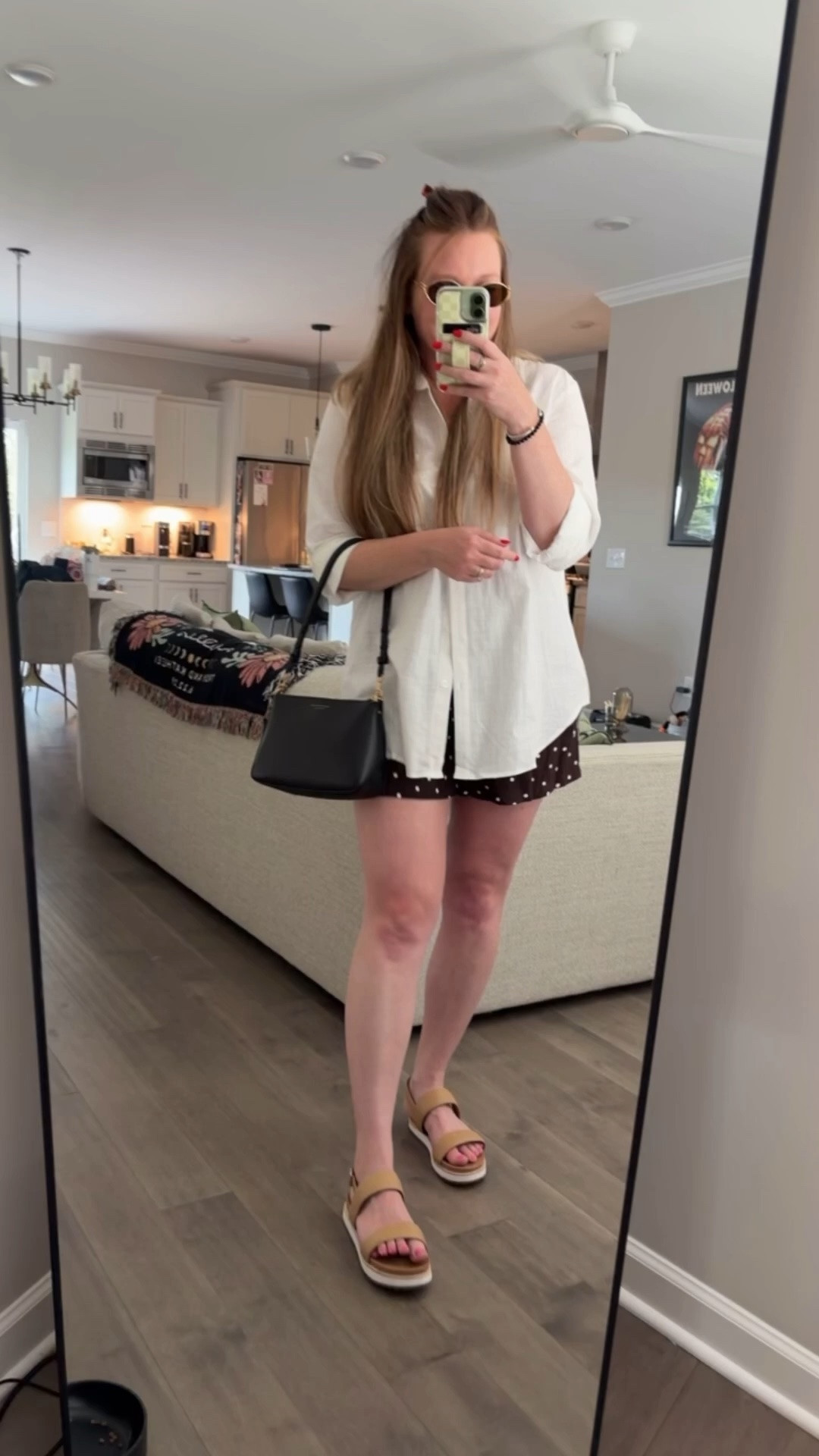 White button down / sized up to a large for an oversized fit 
Brown polka dot shorts / tts wearing a medium 
Platform leather sandals - super comfortable! - tts 
Miu Miu sunglasses 
Black shoulder bag 
Silver bracelet and ring / two tone
Evil eye necklace

#LTKootd #LTKdayinmylife #LTKSaleAlert