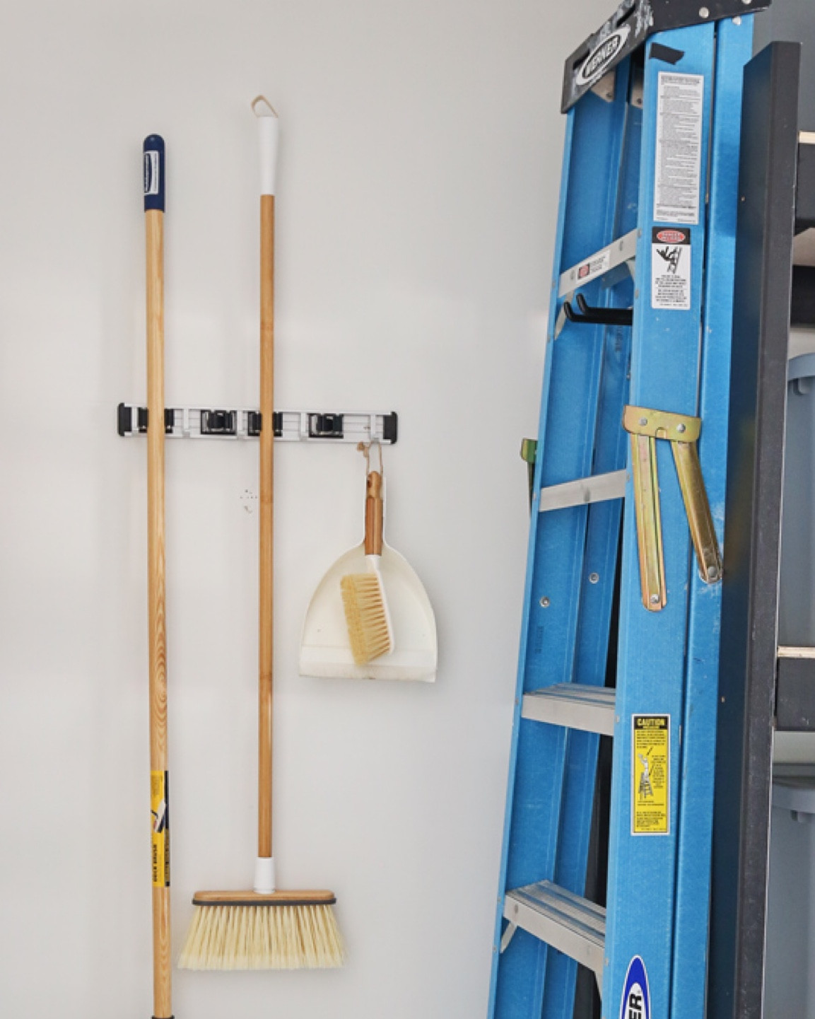 Simple Ladder and broom organization ideas for the garage.

Angled broom bamboo handle amazon 
Werner 6’ ladder amazon 
Metal storage hooks amazon 
Wall mount broom holder amazon 

#LTKfindsunder50 #LTKsalealert #LTKhome