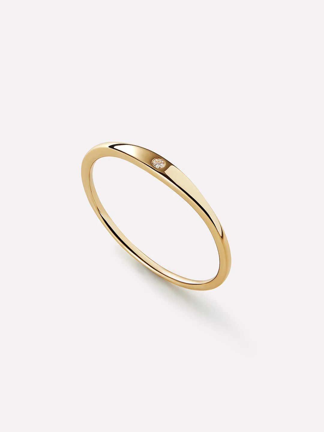 Our super unique and super stackable gold band ring features 100% recycled, waterproof solid gold... | Ana Luisa