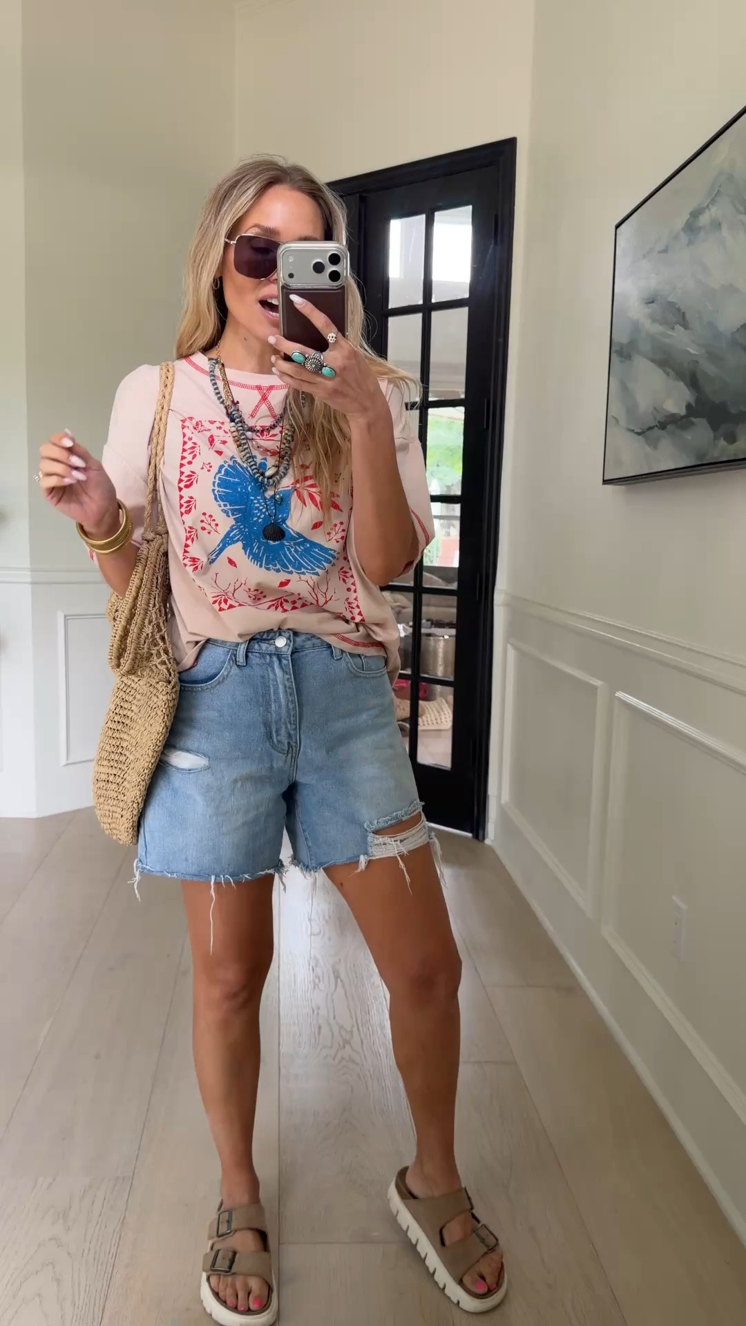 🤍 Giving FP vibes but it’s AMAZON!!!! I’m loving this graphic tee paired with one of my favorite Levi shorts. 

Wearing my tts

#LTKdayinmylife #LTKmomlife #LTKgrwm
