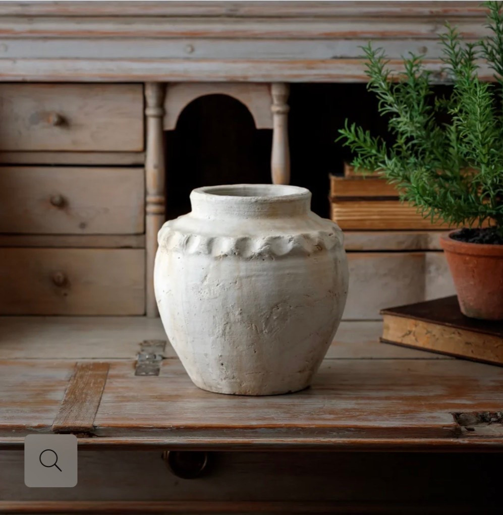 Crafted from terracotta with a softly weathered finish, this stunning pot brings old-world character and warmth to any space. Its timeless silhouette and subtle texture make it beautiful styled on its own or filled with faux stems or greenery.

#LTKHome #LTKSaleAlert #LTKSeasonal
