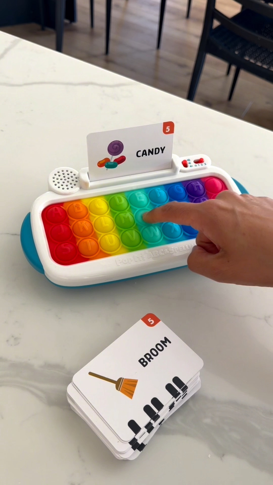 each card gives them a word (like CANDY), and they have to find the right letters and pop them into place to spell it. It’s one of those toys that makes learning feel like a game, which is exactly why my kids keep reaching for it.

If you’re looking for a fun, screen-free activity that sneaks in learning, this one’s a winner!🫶🏻

#learningthroughplay #educationaltoys #preschoollearning #preschoolfun #preschool

#LTKKids