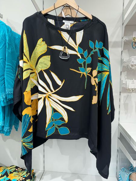 You'll love the lightweight feel of our Placed Palms Poncho. This design features a colorful, seasonal palm print. This covering pairs well with denim of all kinds.
Made from lightweight woven fabric.
@lovechicos

#LTKStyleTip #LTKSaleAlert #LTKOver40