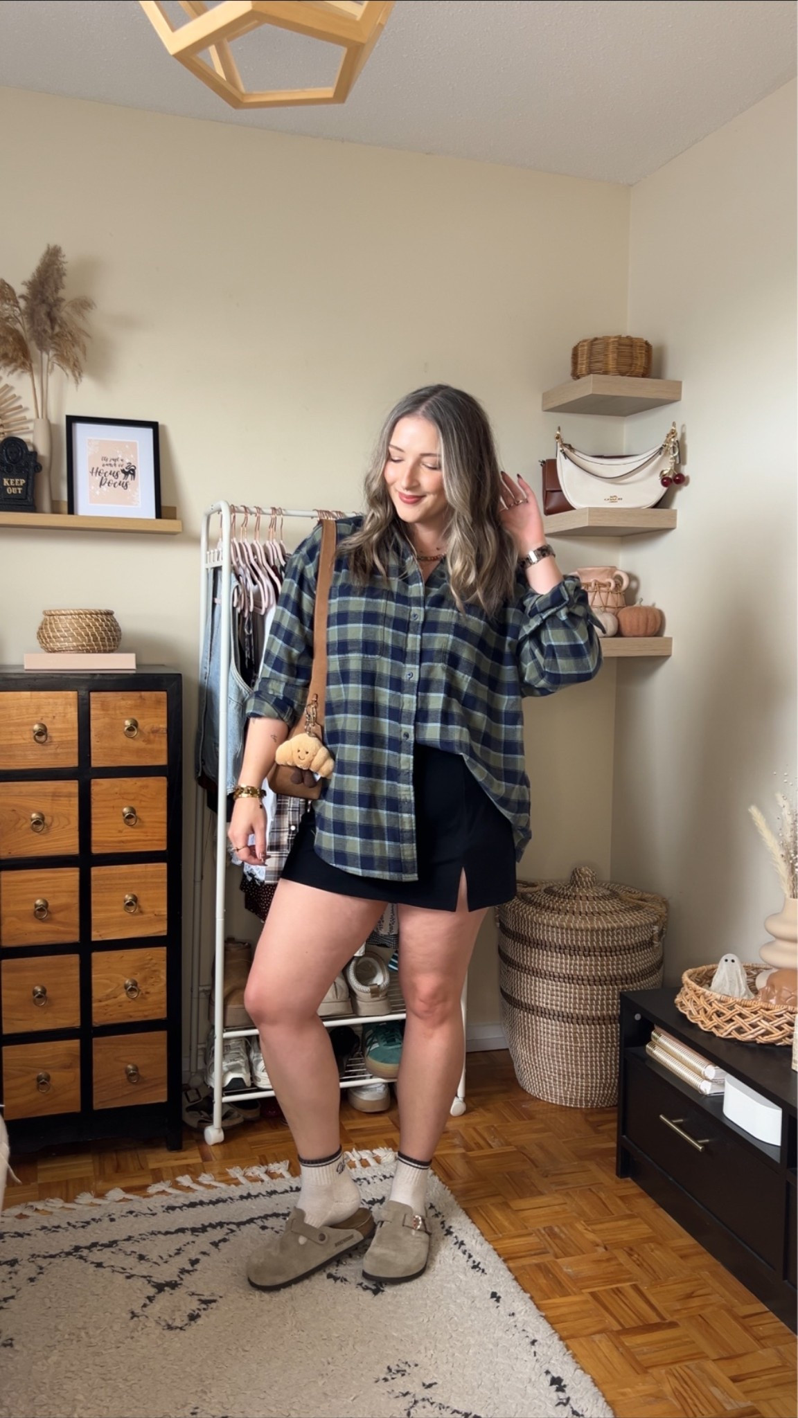 Casual fall outfit! Wearing M in the plaid flannel shirt and L in the black mini skirt (has built in shorts!) I’m a 9.5-10 shoe and wear a 40 in the Birkenstocks.