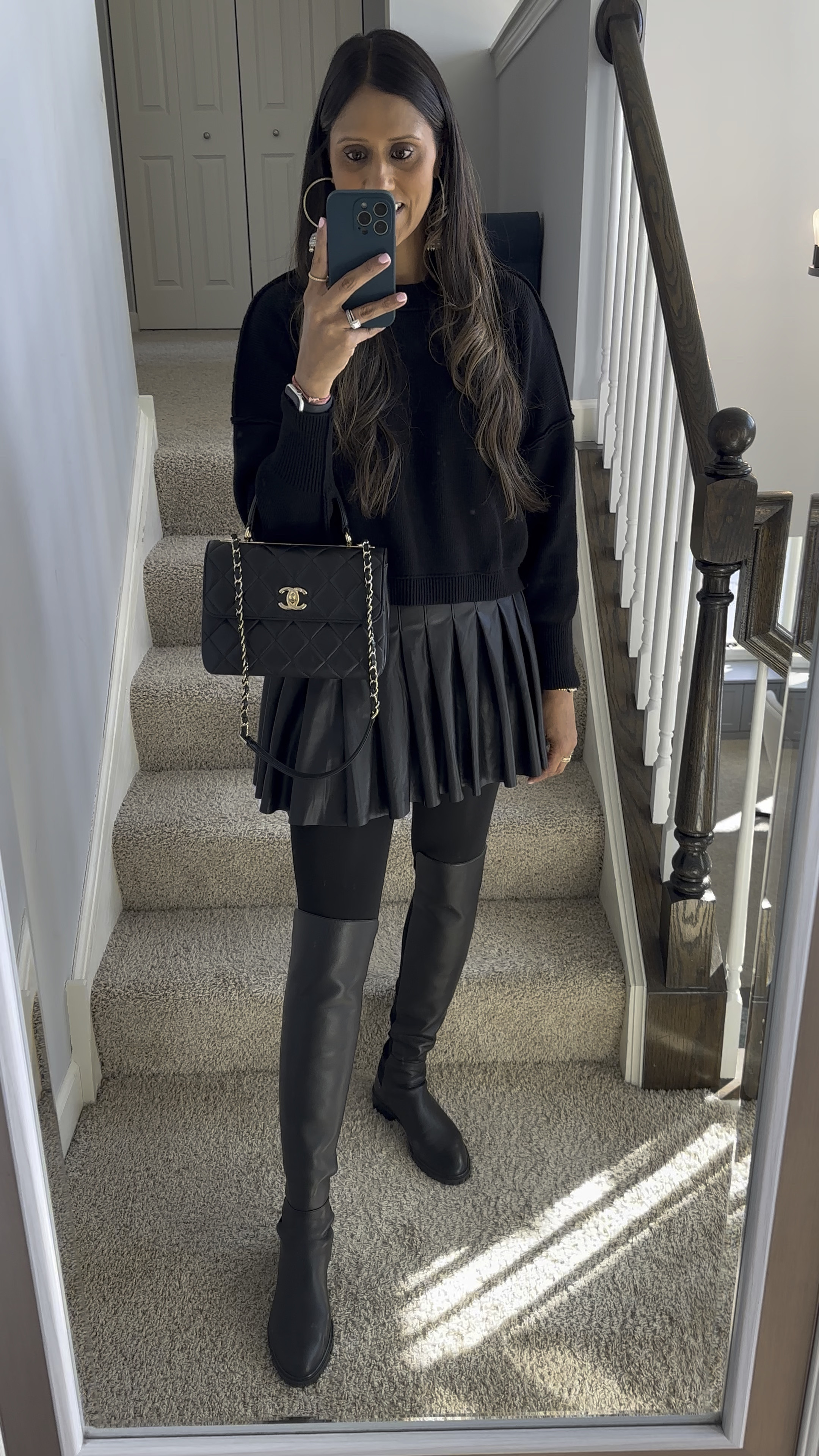 All black for this Thursday! I saw this outfit on an ad for Stuart Weitzman and that’s actually what got me obsessed with the boots - it looks perfect together. Love this faux leather skirt, true to size

#LTKParties #LTKWatchNow #LTKWorkwear