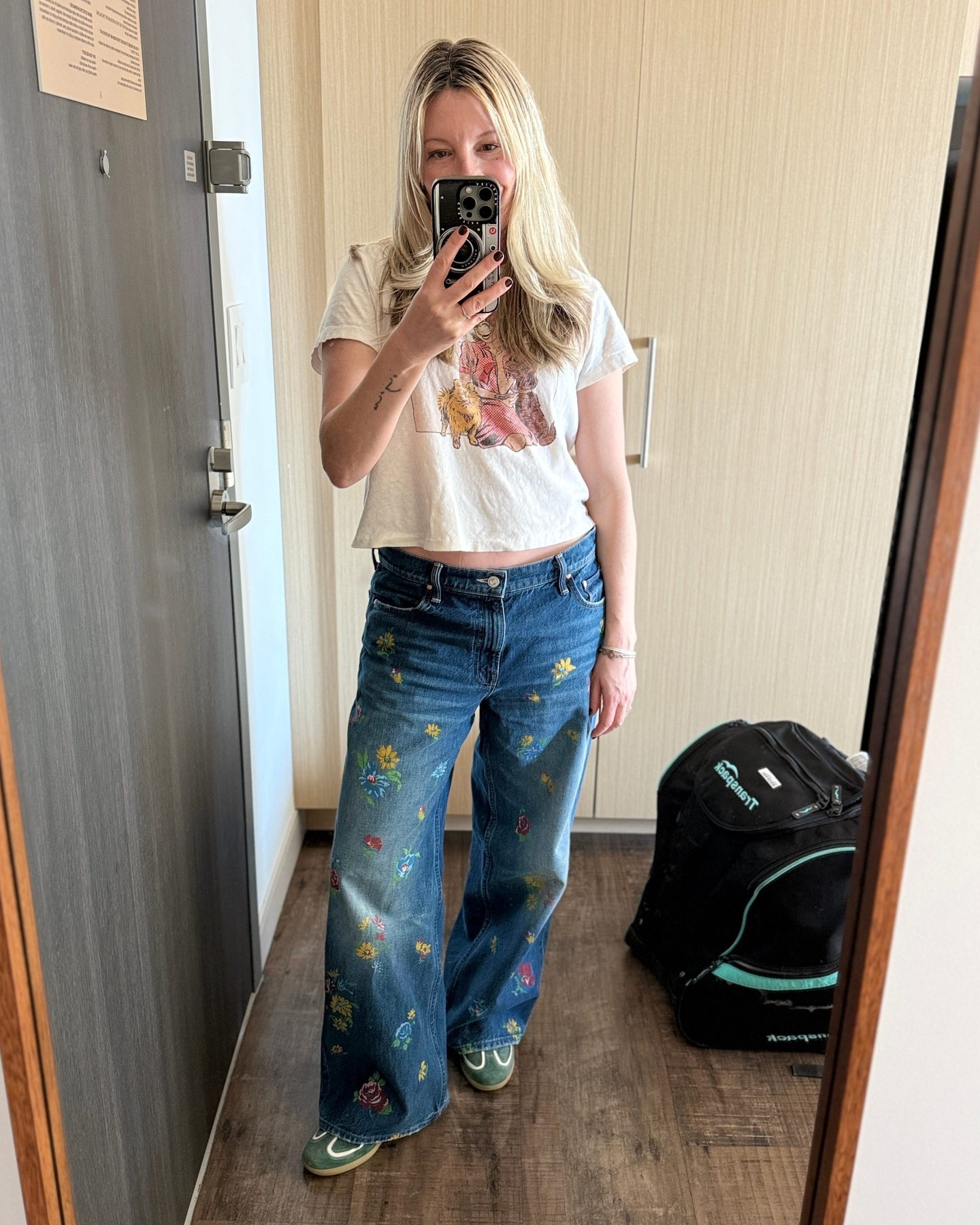 I’ve been wearing these MOTHER floral jeans non-stop... even on the plane.