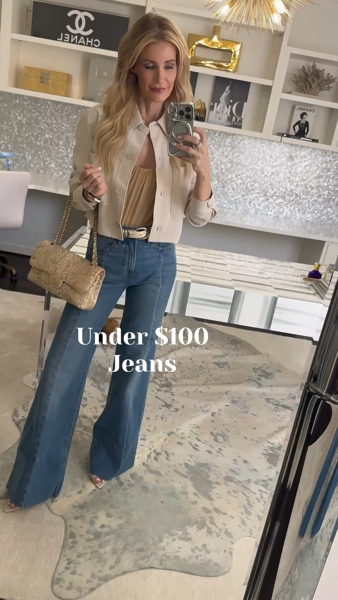 These under $100 Express high-waisted flare jeans are so chic and incredibly flattering—the front seam creates a long, elongating effect that makes your legs look miles long. I styled them with a sheer nude bodysuit and a cropped jacket for an easy spring outfit that feels polished but still effortless.

Sizing: Wearing a size 0 regular in the jeans. 

 #LTKootd #LTKSeasonal #LTKOver40