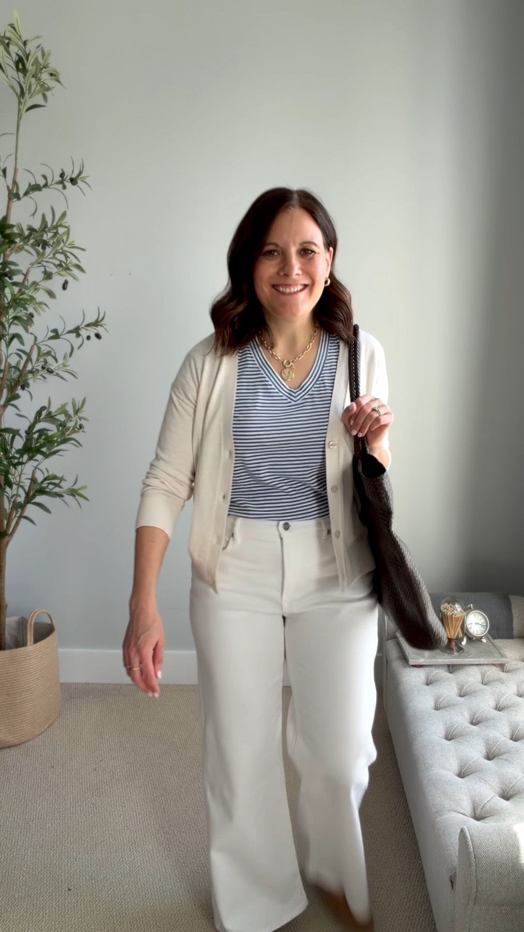 Spring jeans capsule wardrobe outfit fit notes: These white jeans fit TTS, the striped tee fits big, I'm in a small. Im in a medium in this cardigan (true to sizing chart). Go down a half size in these Target flats. Similar options are linked. 

 #LTKSaleAlert #LTKOver40 #LTKMidsize