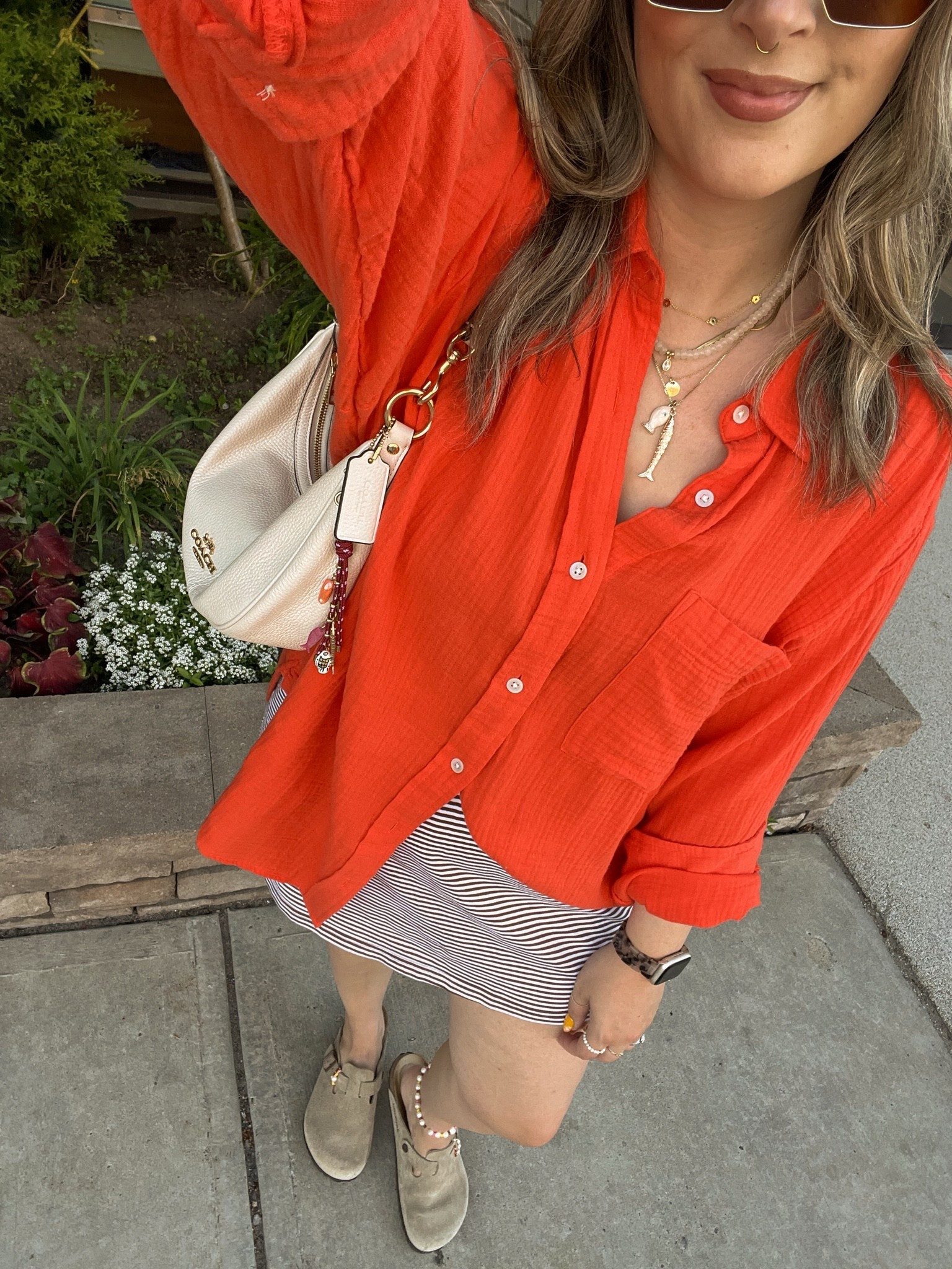 Easy summer outfit! Wearing my usual size L in both the red orange shirt and striped mini skirt (has built in shorts!). Birkenstock Bostons are super comfy, I’m a 9.5-10 shoe and wear size 40

#LTKsummer #LTKsale #LTKmidsize
