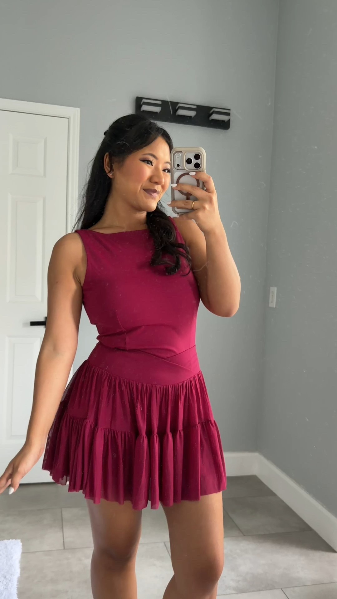 Blogilates Women's Ballerina Skort wearing size medium. Blogilates Women's Boatneck Crisscross Tank Top wearing size large. Blogilates Women's Marshmallow Full Zip Hooded Sweatshirt wearing size medium. 