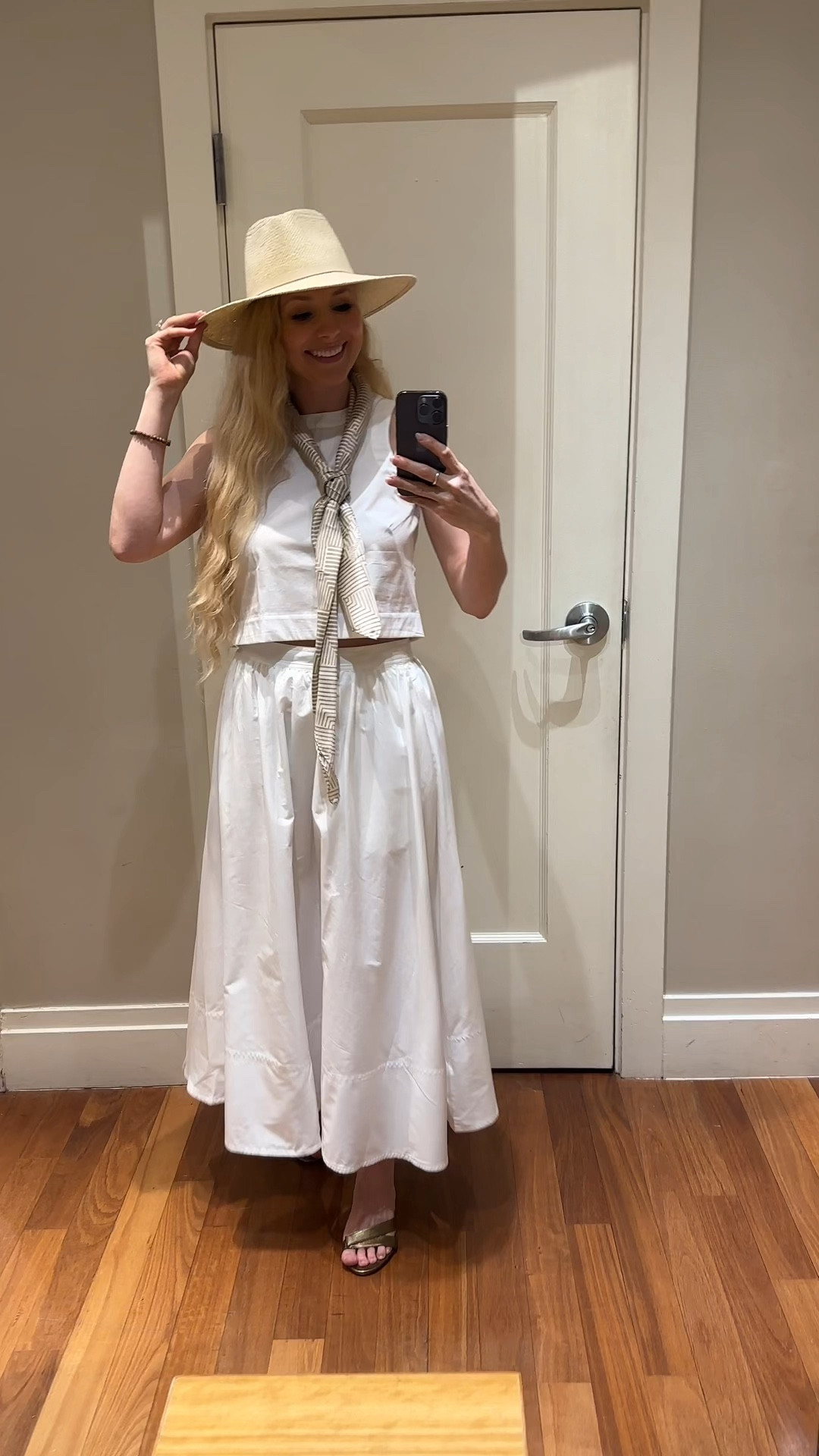 Two piece white loose cotton top with matching white cotton skirt. Loose and breathable. Good for hot weather. Silk scarf compliments the neck and broad rimmed hat completes the look with bronze high heals below.
#BananaRepublic 

#LTKSeasonal #LTKVideo #LTKtravel